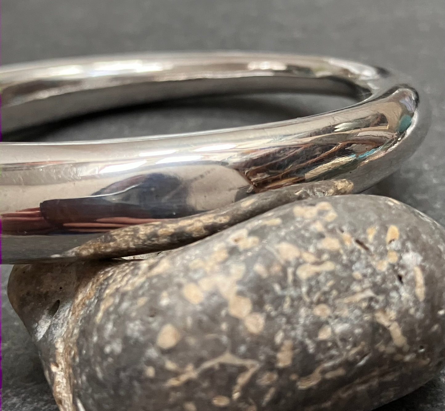 Absolutely beautifully elegant vintage tapered sterling silver bangle.