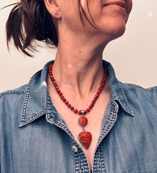 A striking vintage sponge coral necklace featuring beautifully patterned coral beads