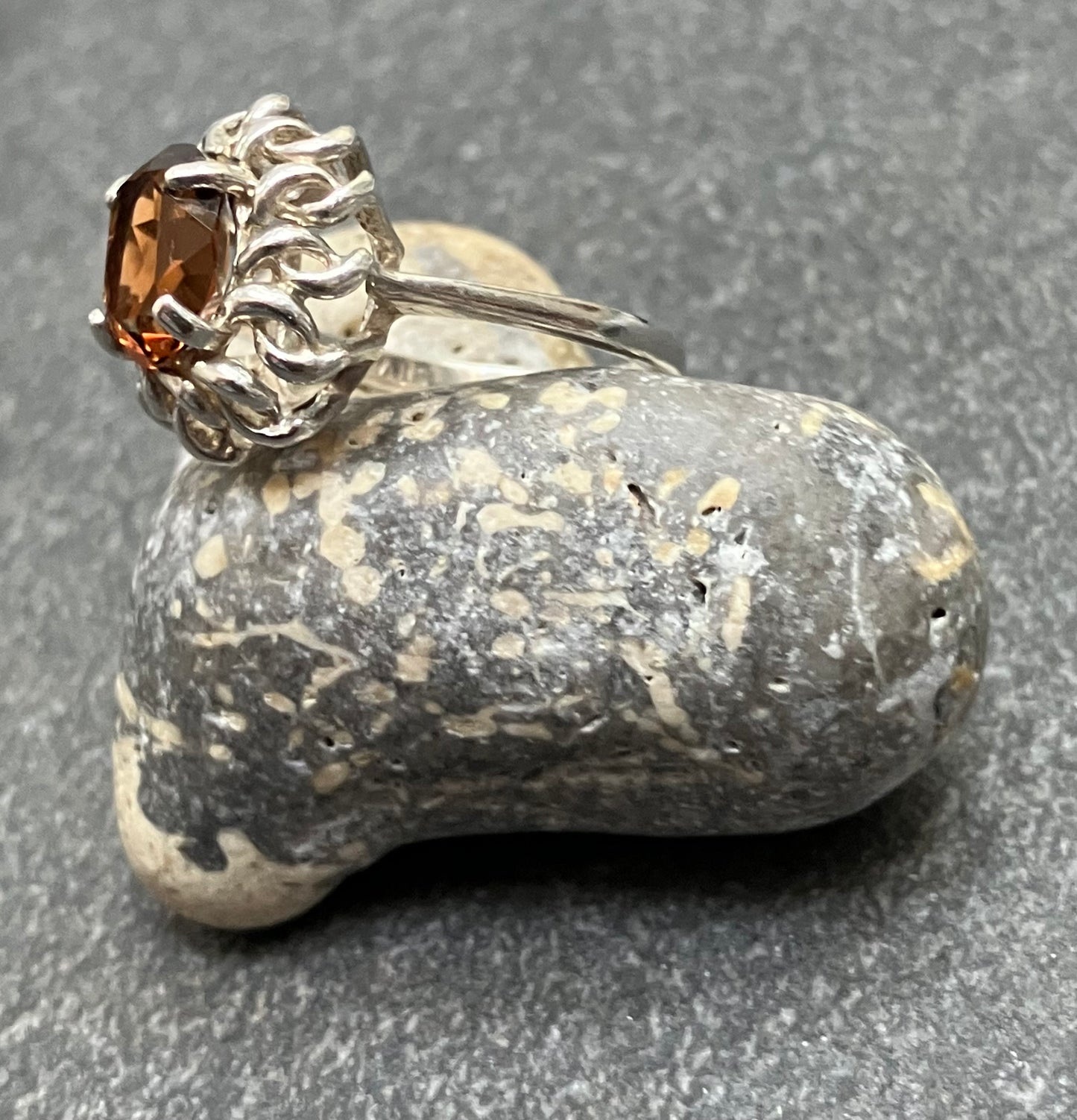 Vintage sterling silver ring set with a mandarin garnet cut stone