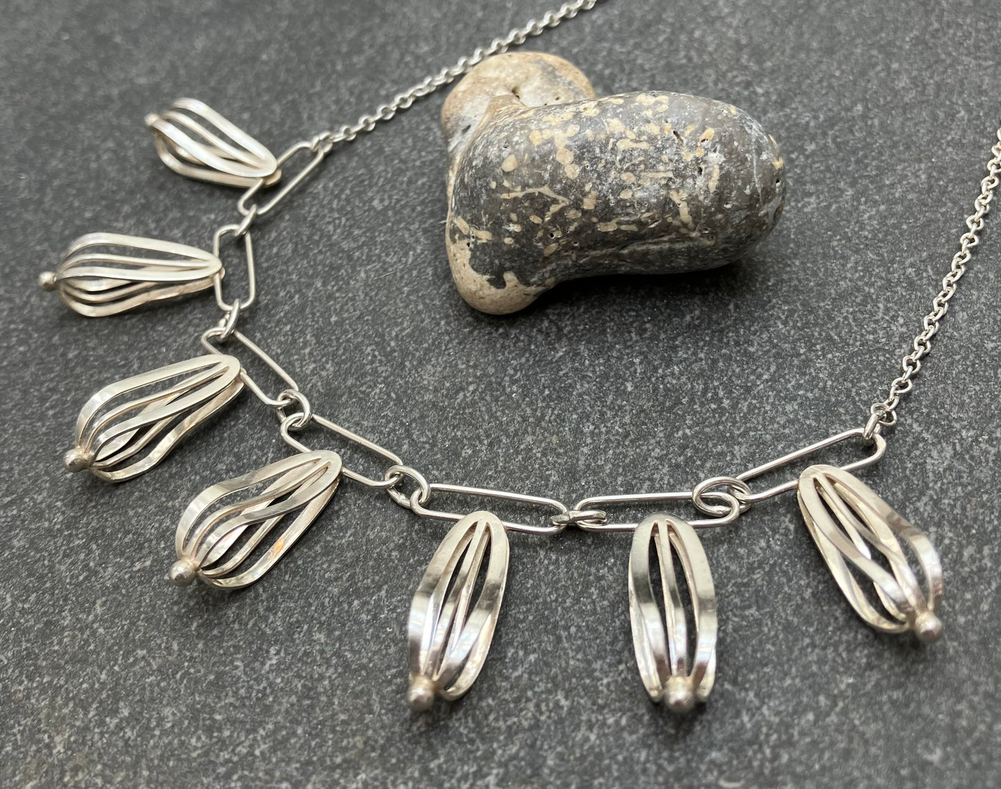 Artisan sterling silver sculptural necklace.