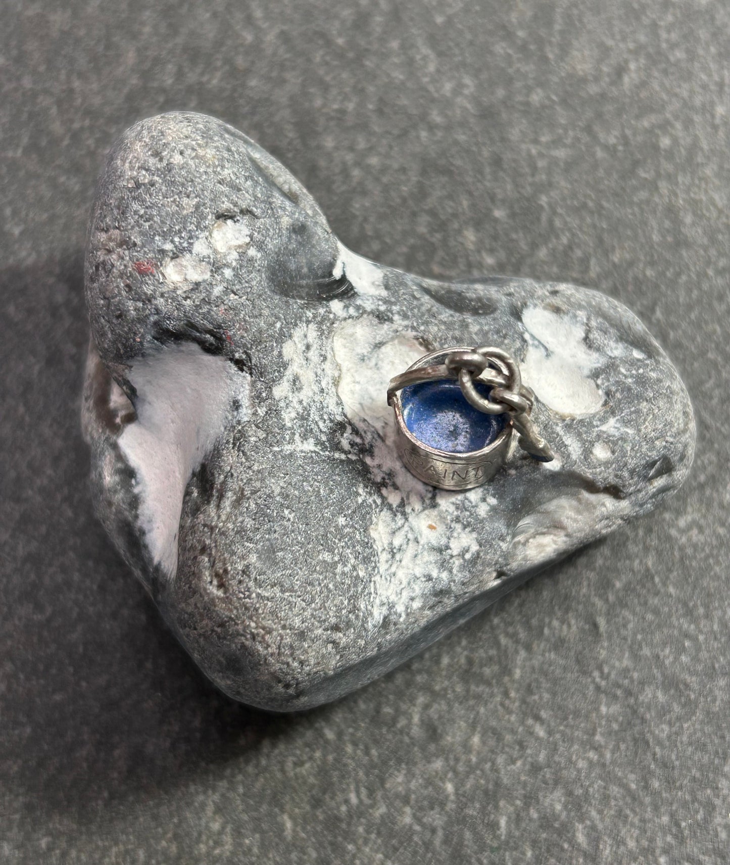 Pendant beautifully crafted in the shape of a painter’s paint pot and brush