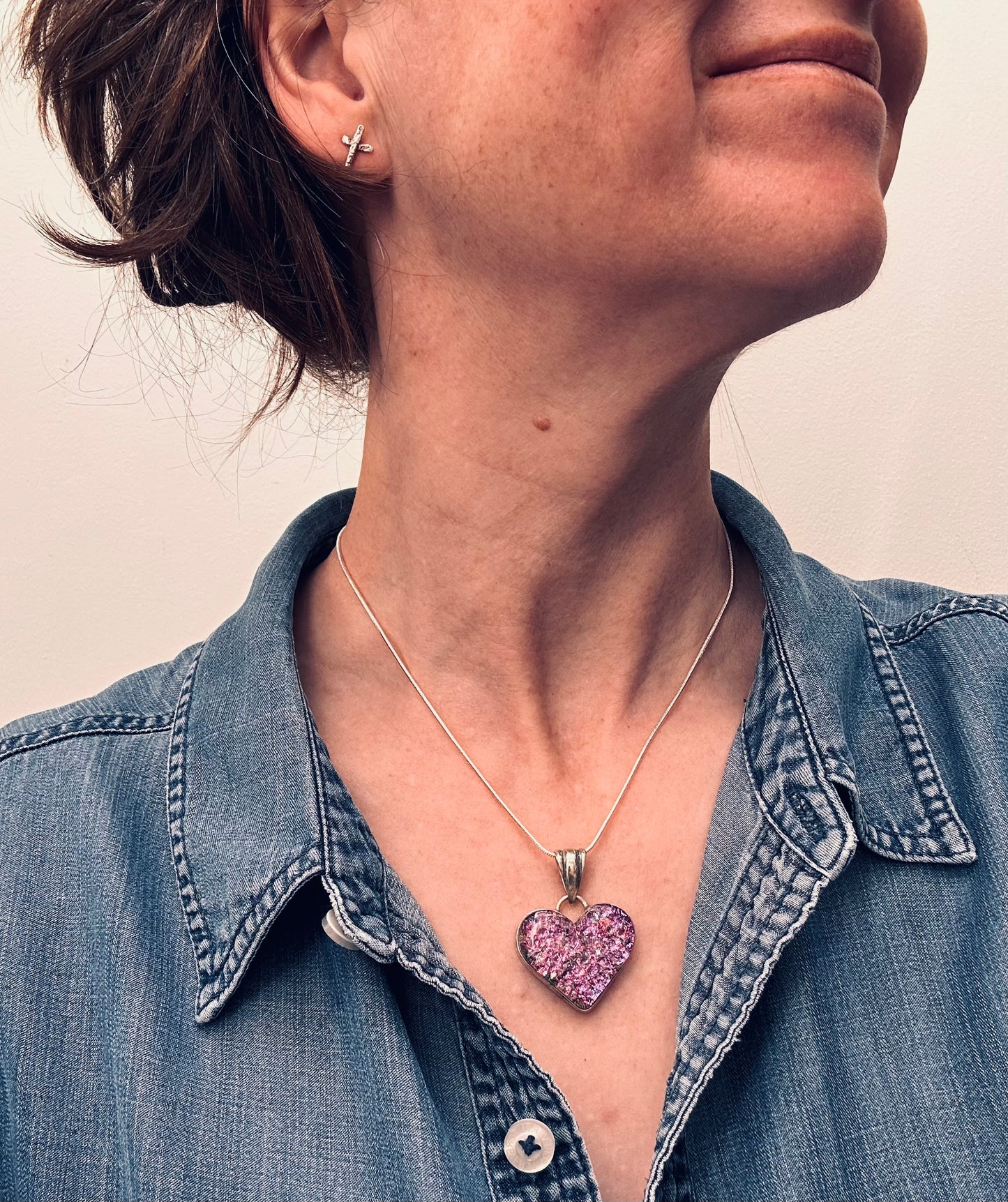 A beautiful vintage sterling silver and dichroic glass heart pendant