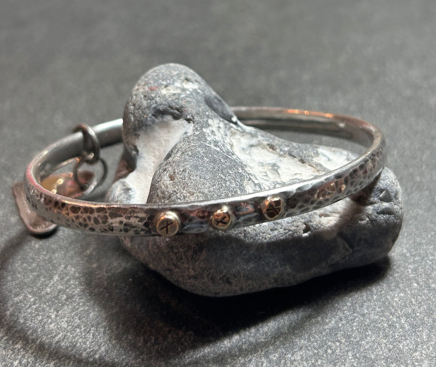 Artisan bangle work ‘X’s and hearts.