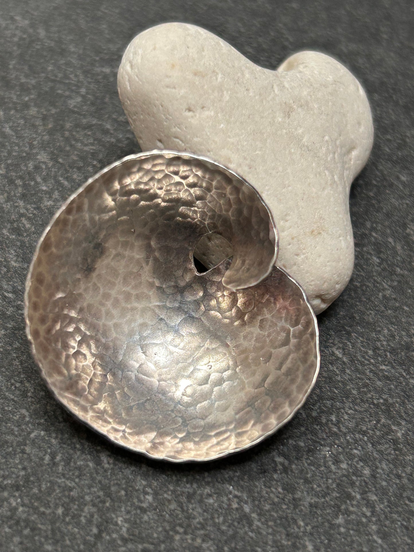 A striking pair of artisan-made vintage sterling silver earrings