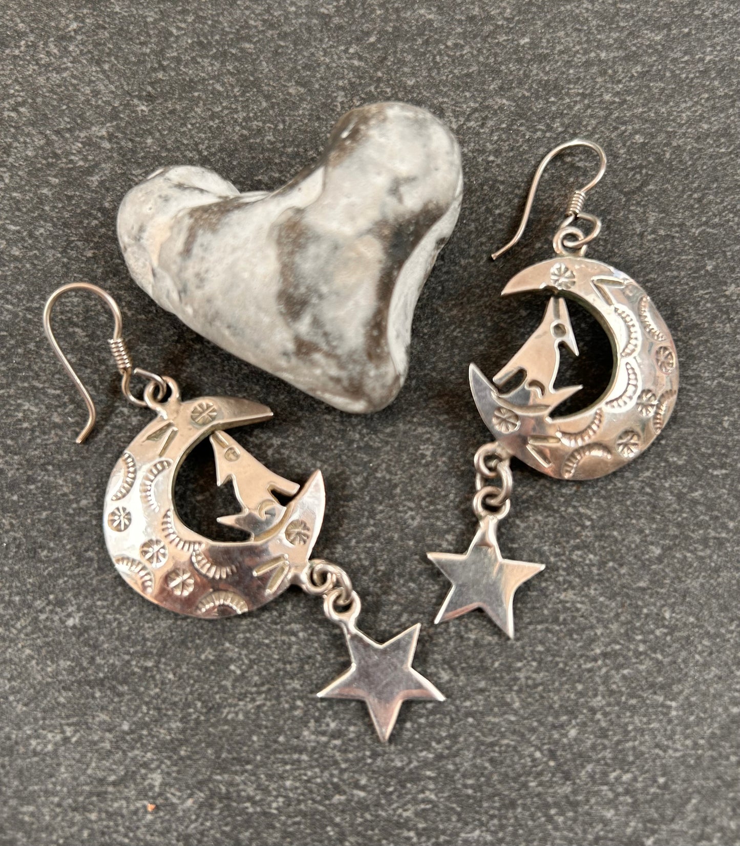 Fantastic vintage sterling silver Mexican earrings featuring a wonderfully whimsical celestial design of a howling wolf nestled within a crescent moon