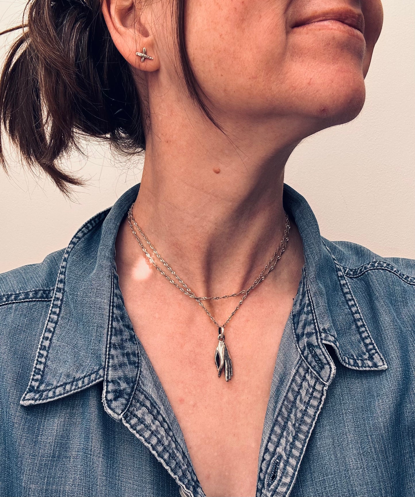 Vintage Hand Pendant
Beautiful vintage hand pendant with index finger and thumb pinched into an elegant pose.