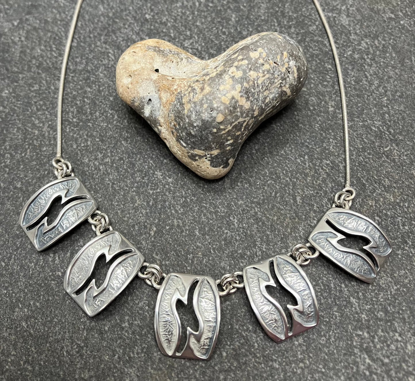 Beautiful vintage sterling silver necklace. Comprising of five beautifully made rectangles.