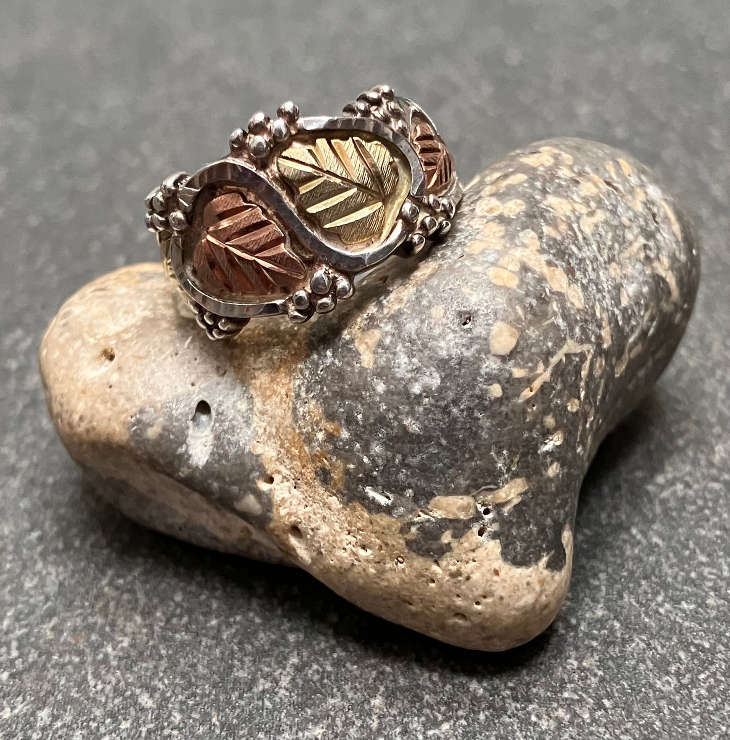 Wonderful vintage sterling silver and 12k gold and rose gold leaf ring. Made by Coleman &Co Black Hills.