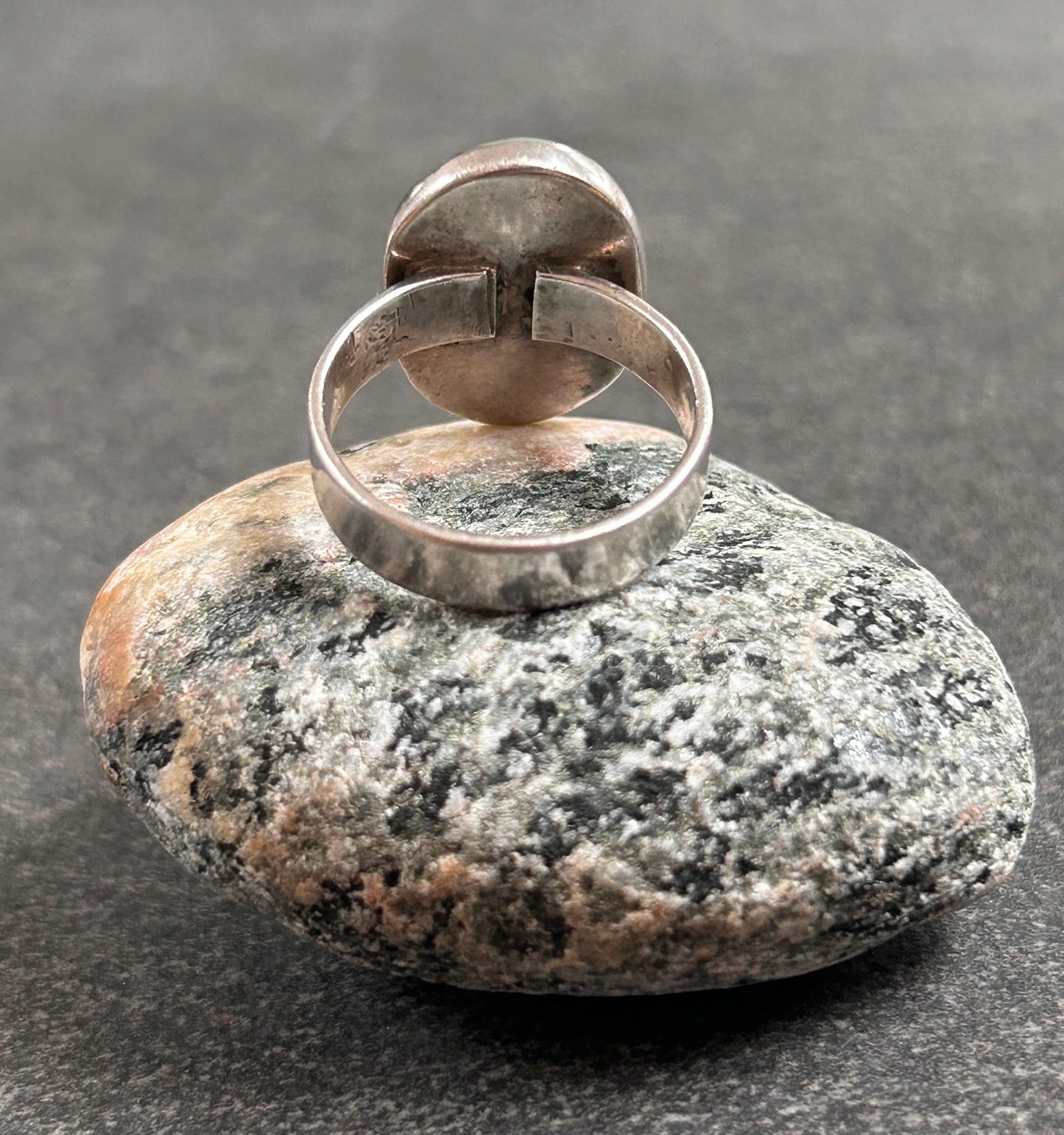 A beautiful vintage sterling silver ring featuring a striking turquoise stone - 1988