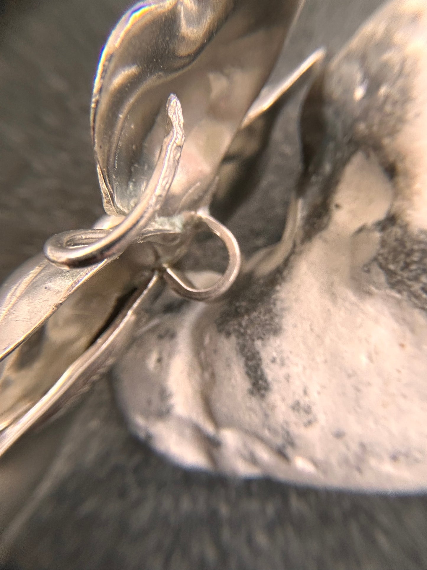 A rare sterling silver dogwood flower pendant from John Wanamaker.