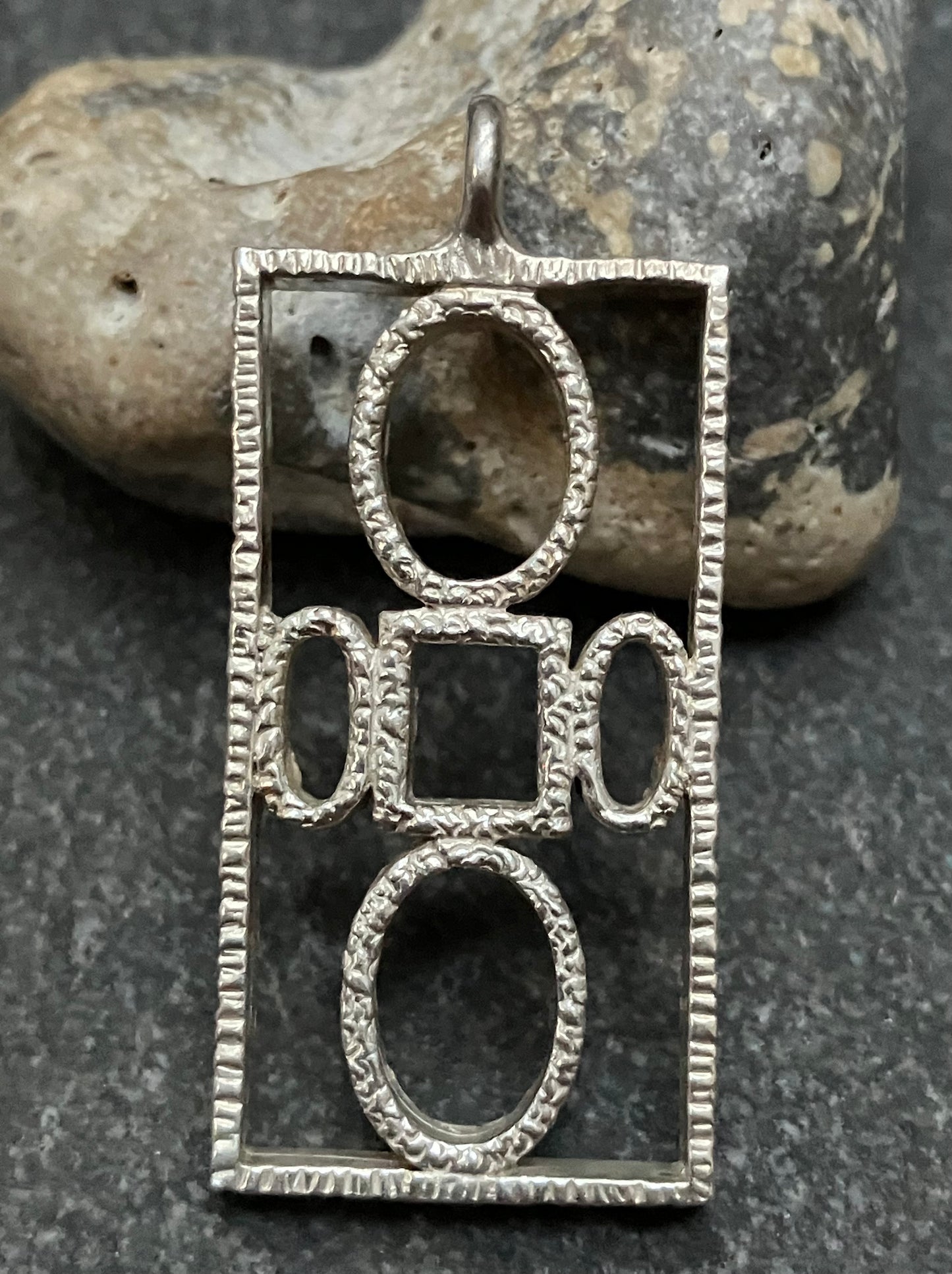 Super example of a vintage Brutalist/Modernist sterling silver pendant by Toye, Kenning & Spencer.