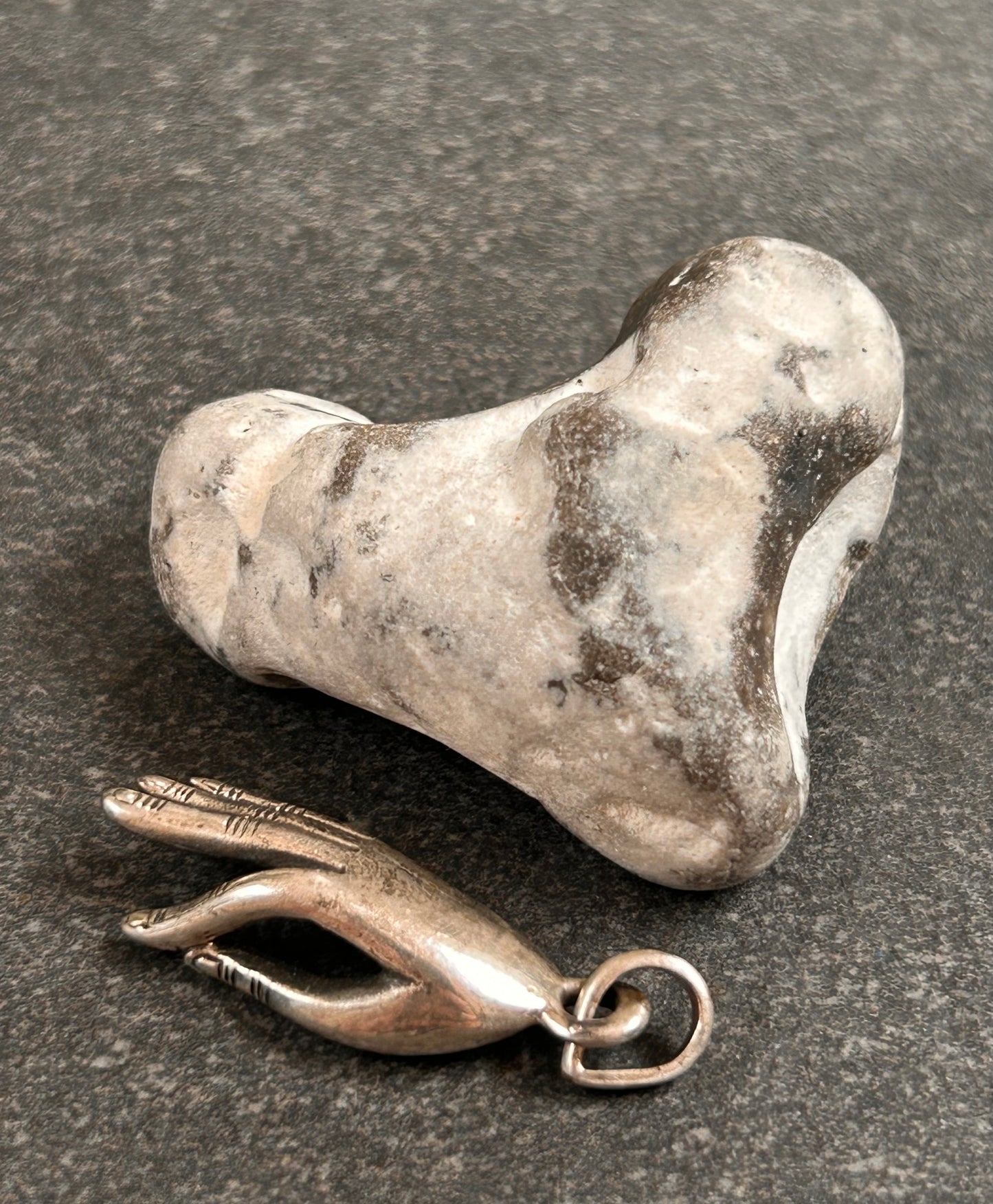 Vintage Hand Pendant
Beautiful vintage hand pendant with index finger and thumb pinched into an elegant pose.