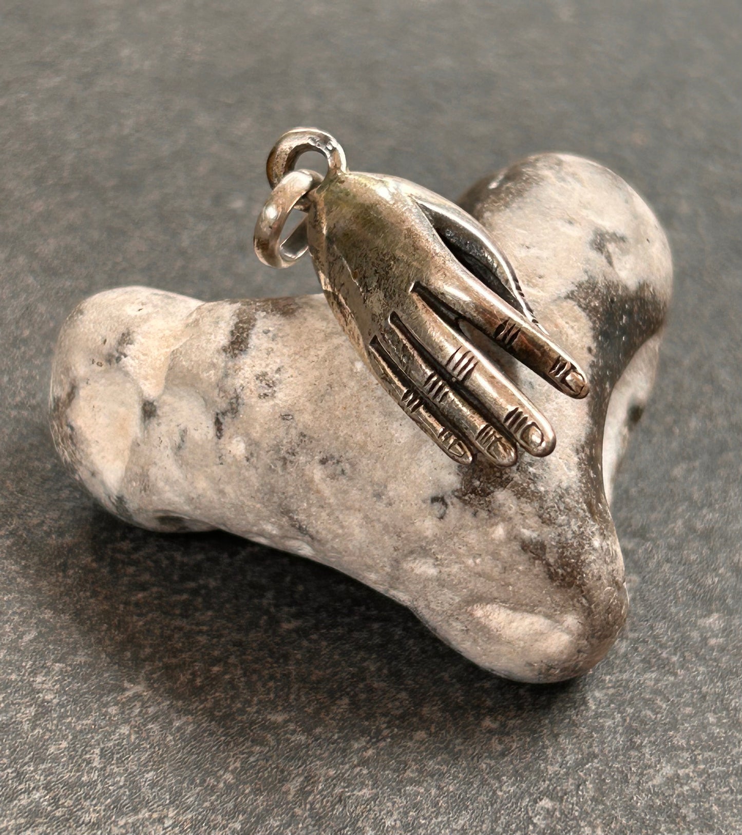 Vintage Hand Pendant
Beautiful vintage hand pendant with index finger and thumb pinched into an elegant pose.