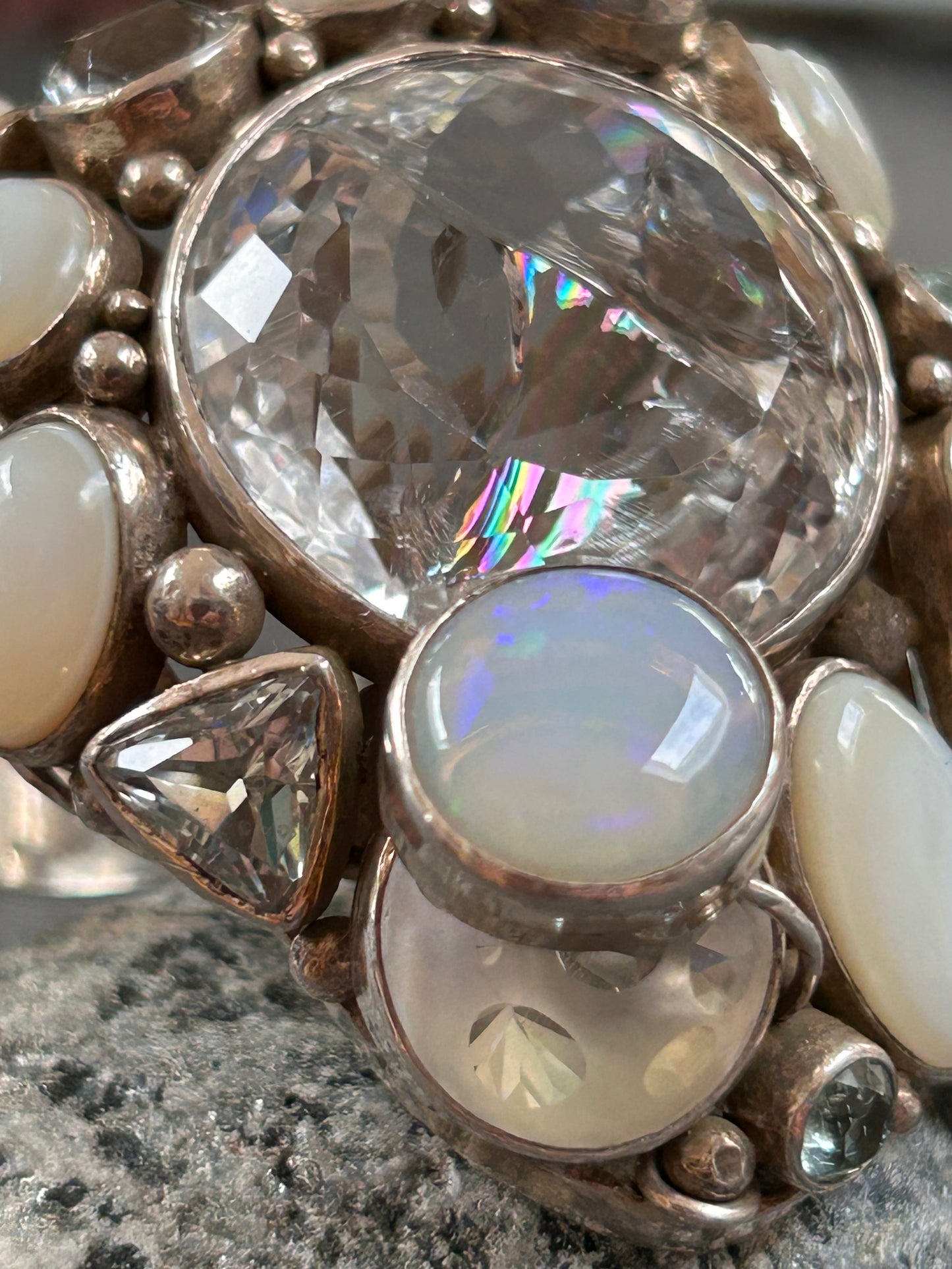 Spectacular Polish Artisan Double-Finger Ring.
Sterling Silver, Rock Crystal, Topaz, Opals, Aquamarine & Pearls.