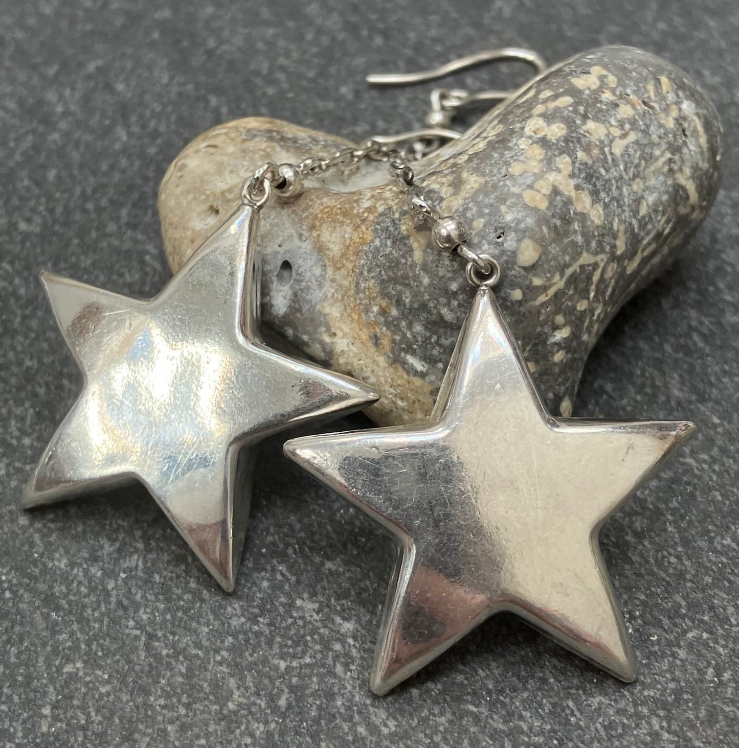 Absolutely fabulous statement vintage sterling silver star earrings.