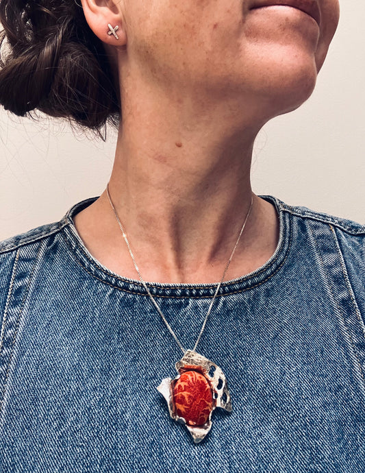 Statement vintage sterling silver and sponge coral artisan pendant with original vintage chain.