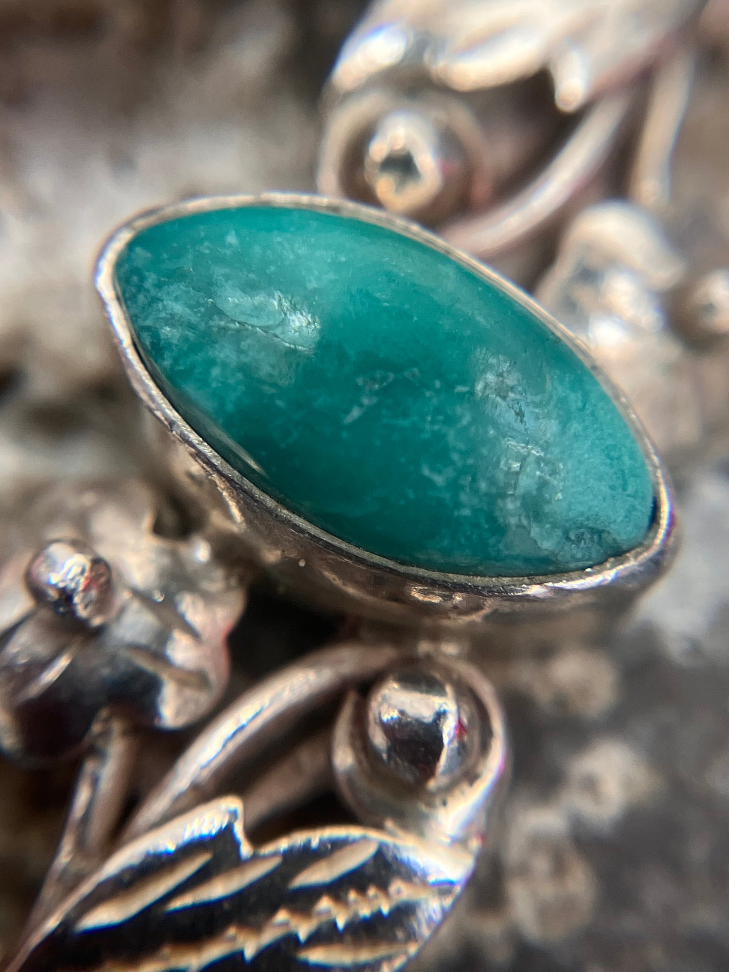 Vintage sterling silver bangle with a fuchsite stone centre.