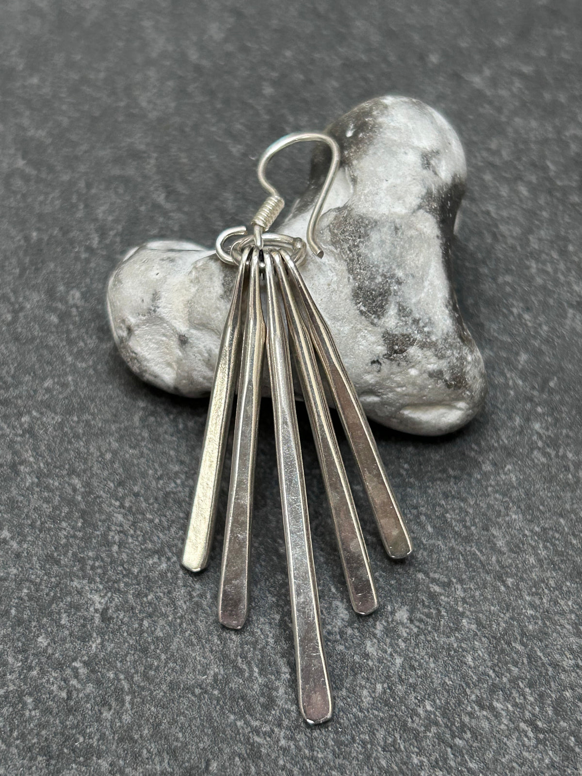 Mexican sterling silver earrings featuring slender bars.