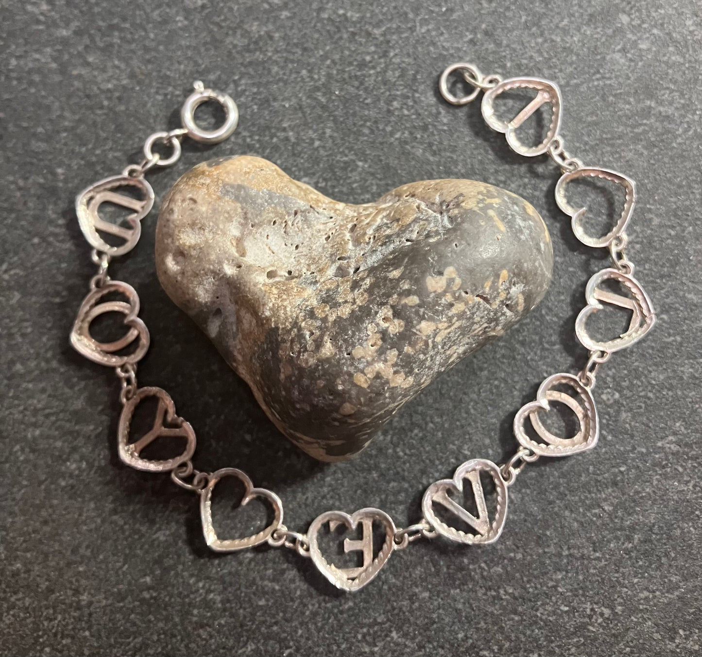 Vintage sterling silver ‘I love you’ bracelet. 1975