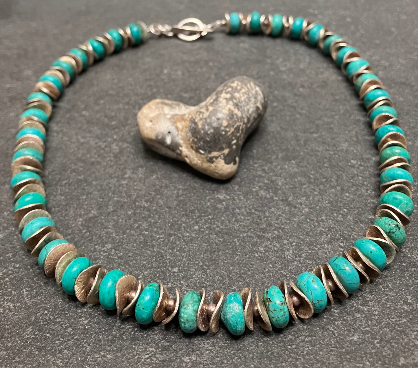 Absolutely stunning artisan made sterling silver and turquoise bead necklace.