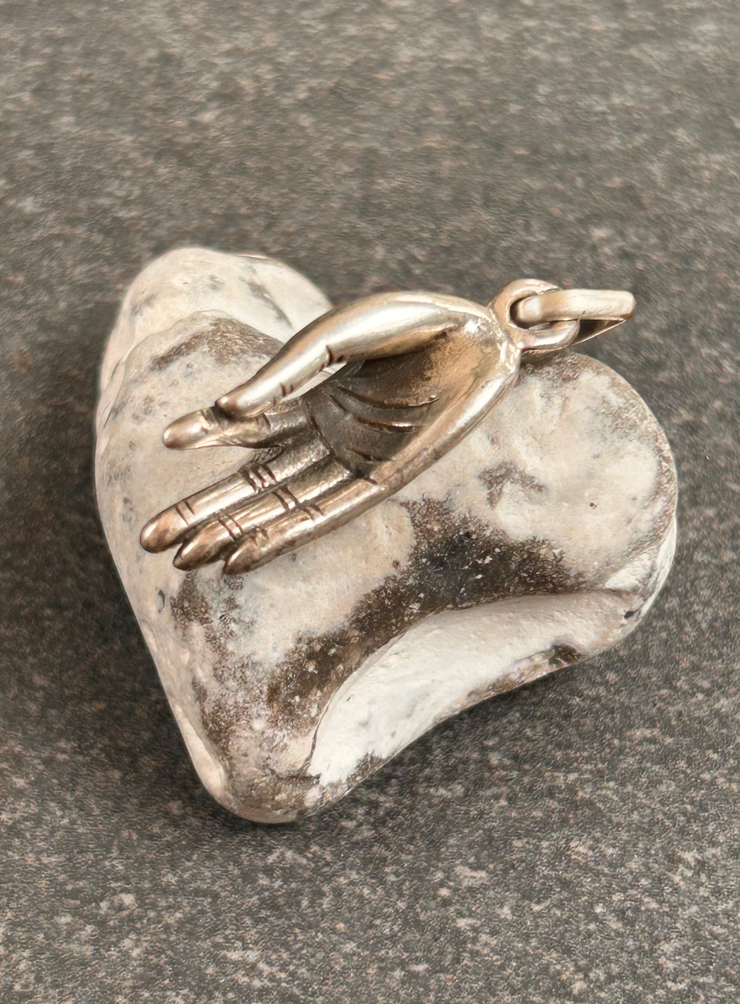 Vintage Hand Pendant
Beautiful vintage hand pendant with index finger and thumb pinched into an elegant pose.