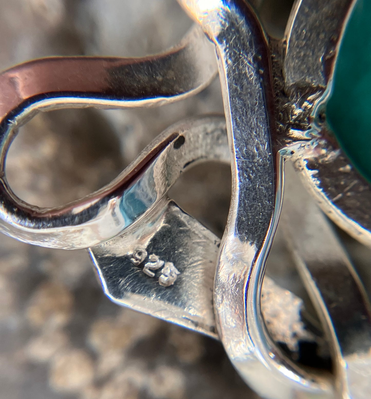 Artisan vintage sterling silver intertwining snake pendant with a piece of Turqurenite in the centre.