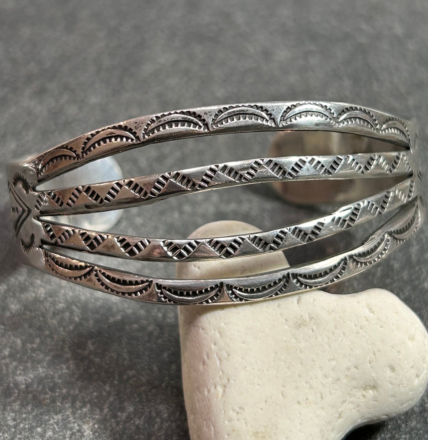 Native American vintage sterling silver bracelet is crafted from a beautifully shaped bar.