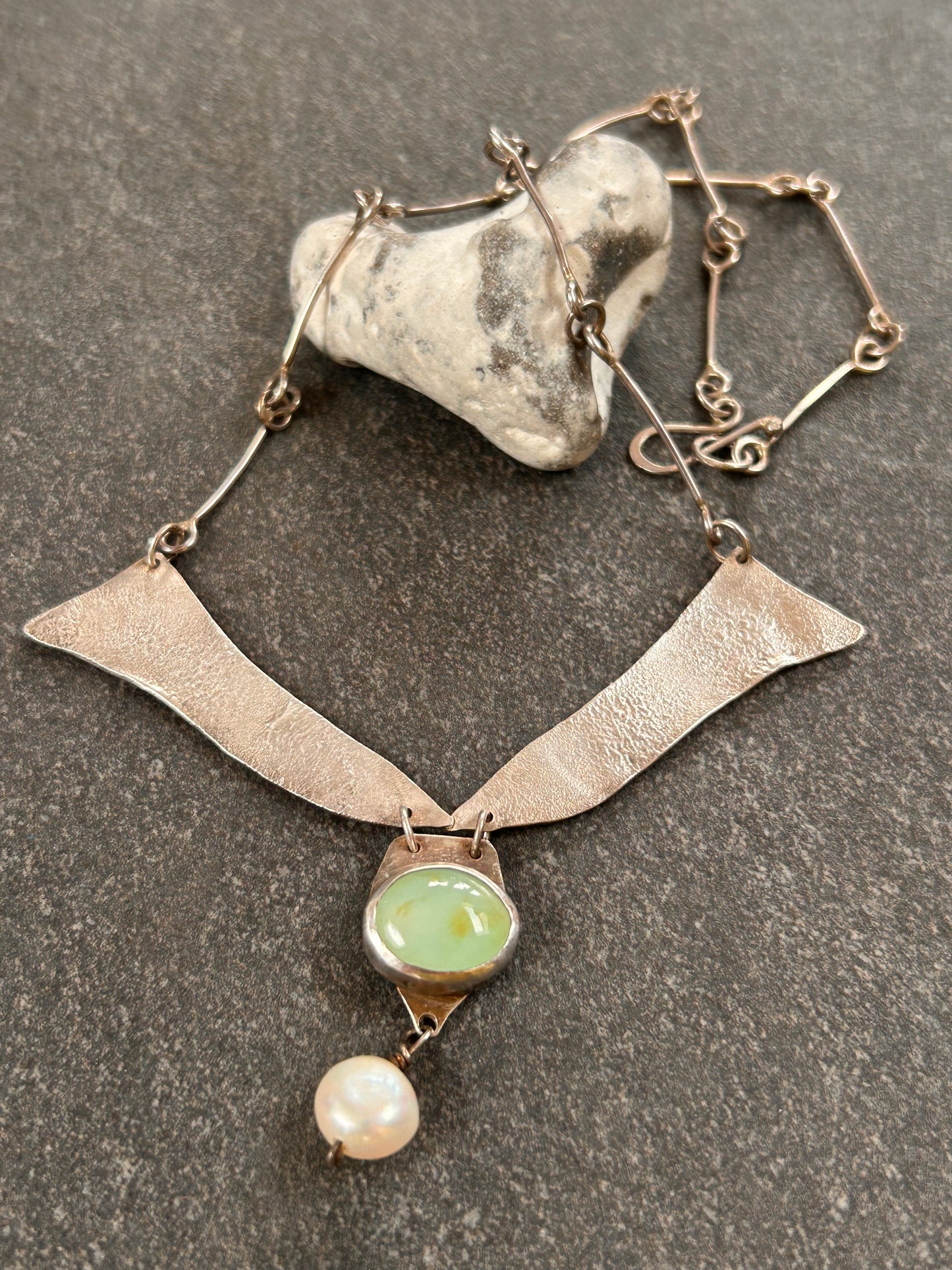 A beautifully handcrafted artisan necklace inspired by the delicate form of sycamore seeds.