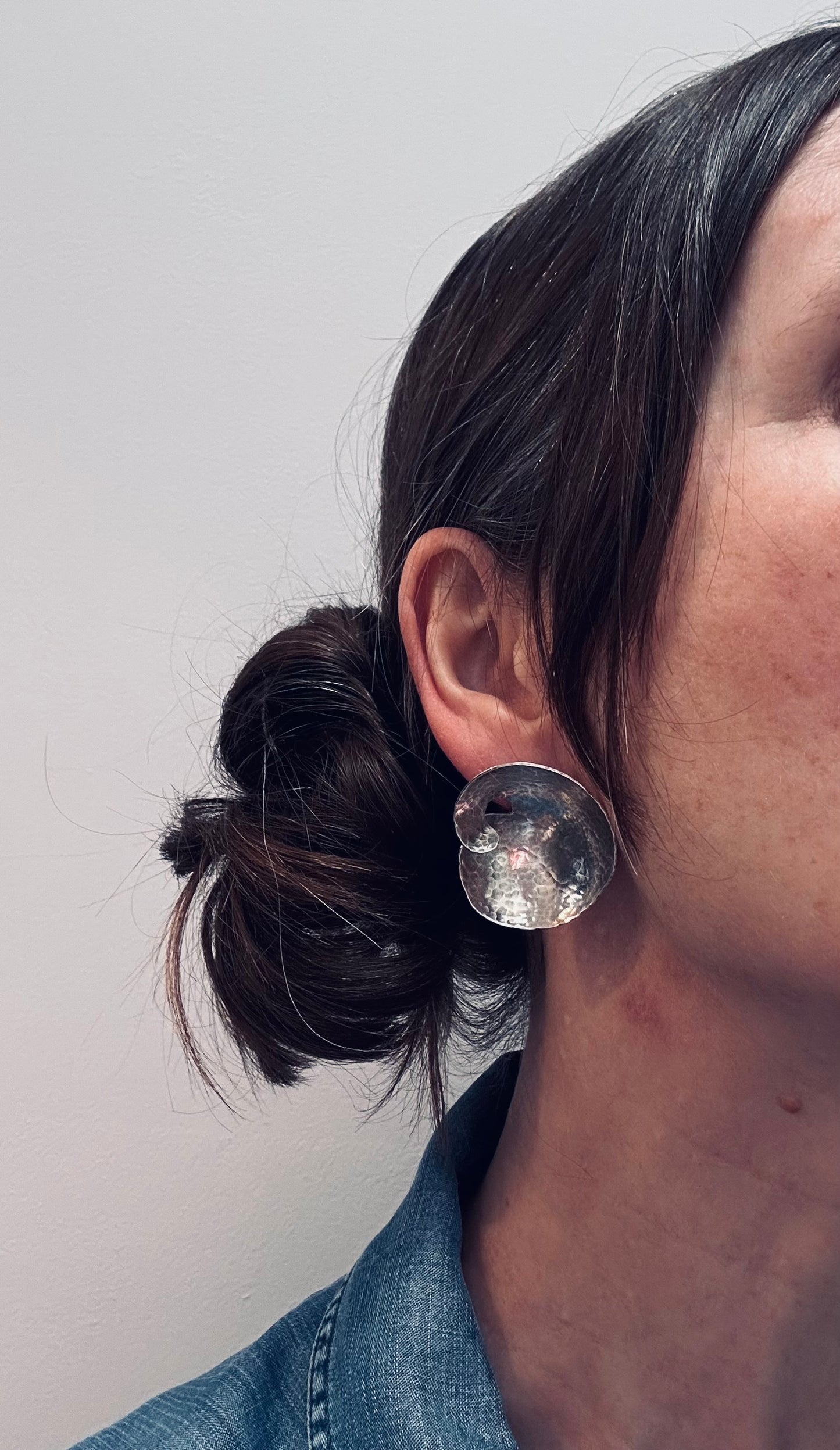 A striking pair of artisan-made vintage sterling silver earrings