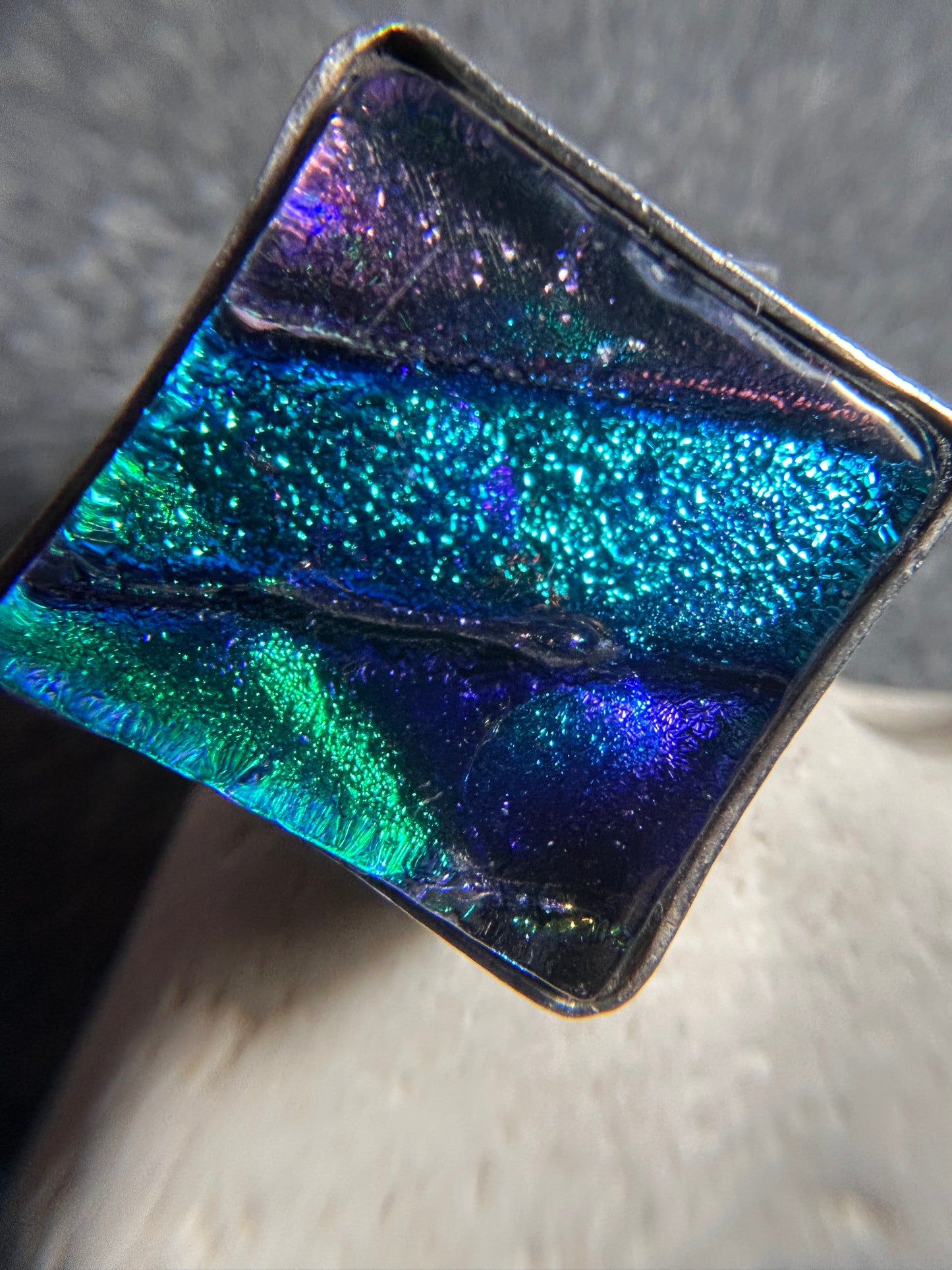 Vibrant vintage sterling silver dichroic glass ring.