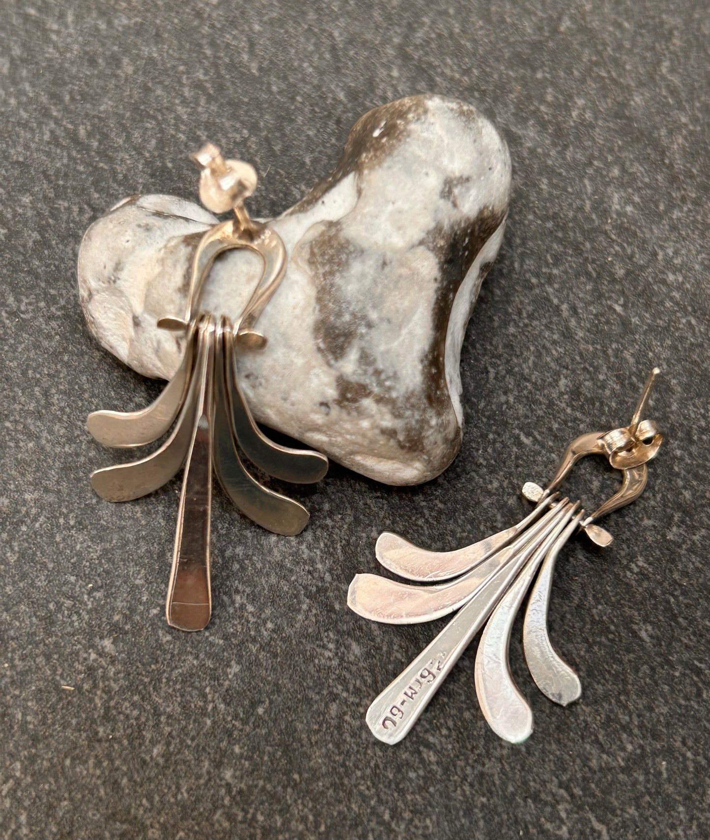 A striking pair of vintage sterling silver Mexican earrings