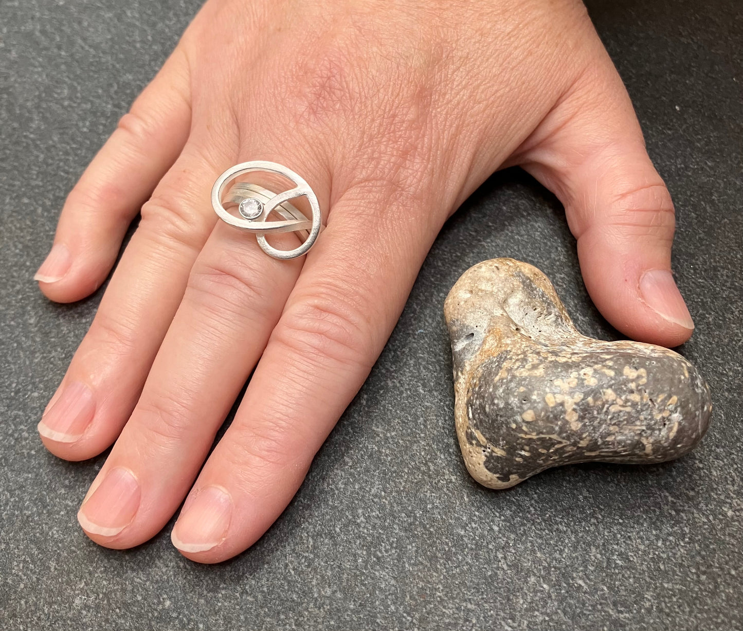 Absolutely stunning vintage sterling silver ring with a cut quartz crystal stone.