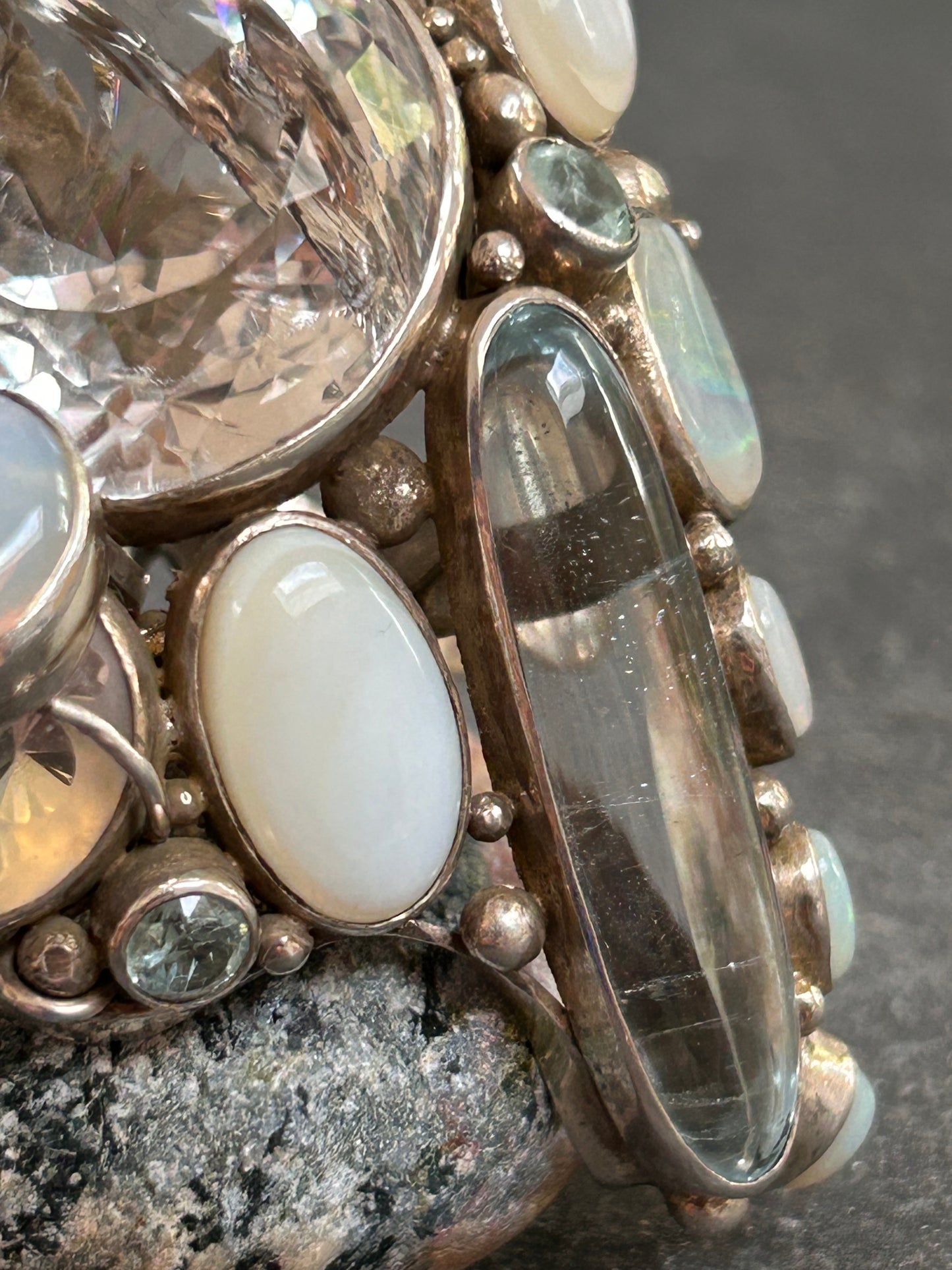 Spectacular Polish Artisan Double-Finger Ring.
Sterling Silver, Rock Crystal, Topaz, Opals, Aquamarine & Pearls.
