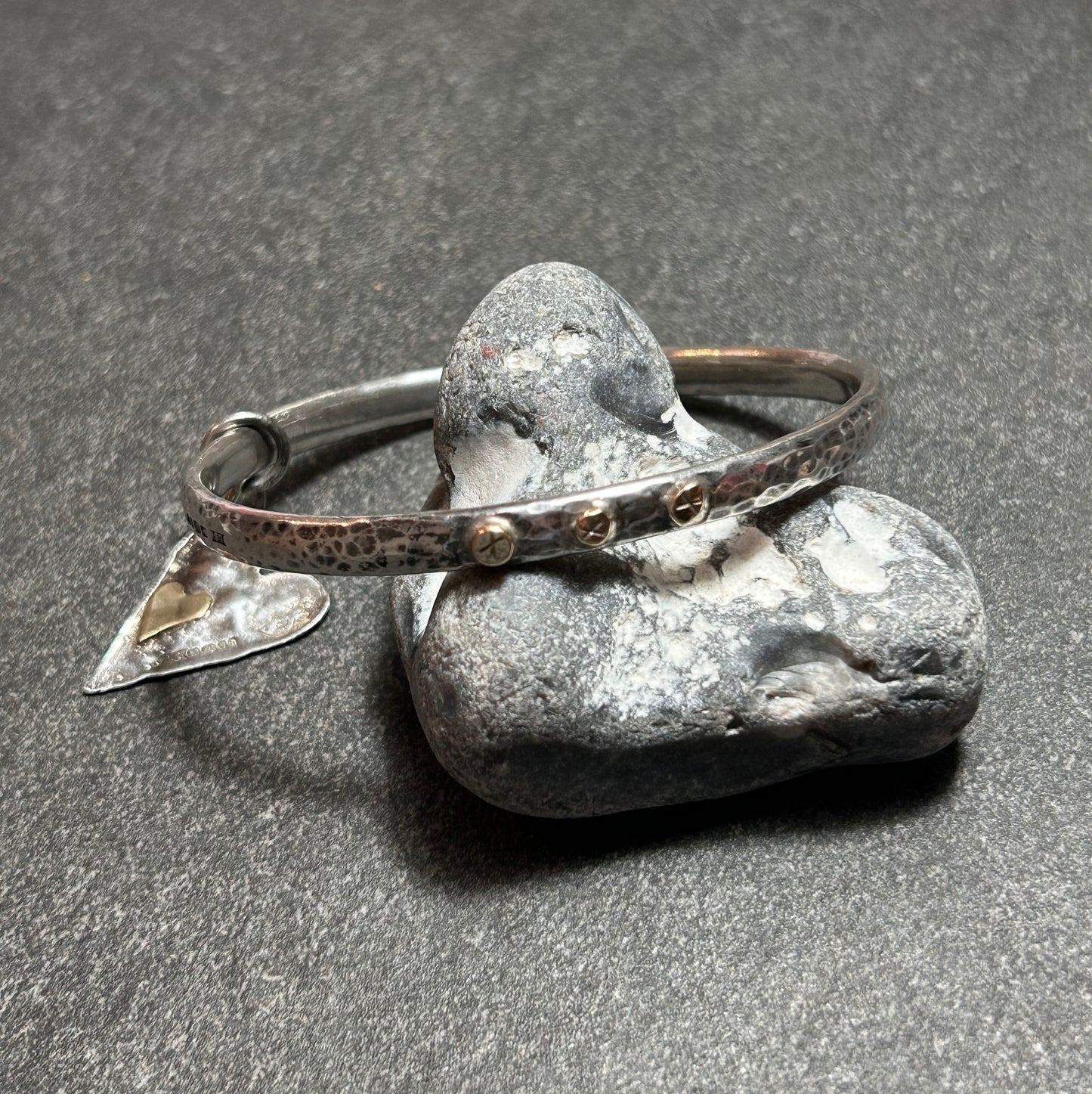 Artisan bangle work ‘X’s and hearts.