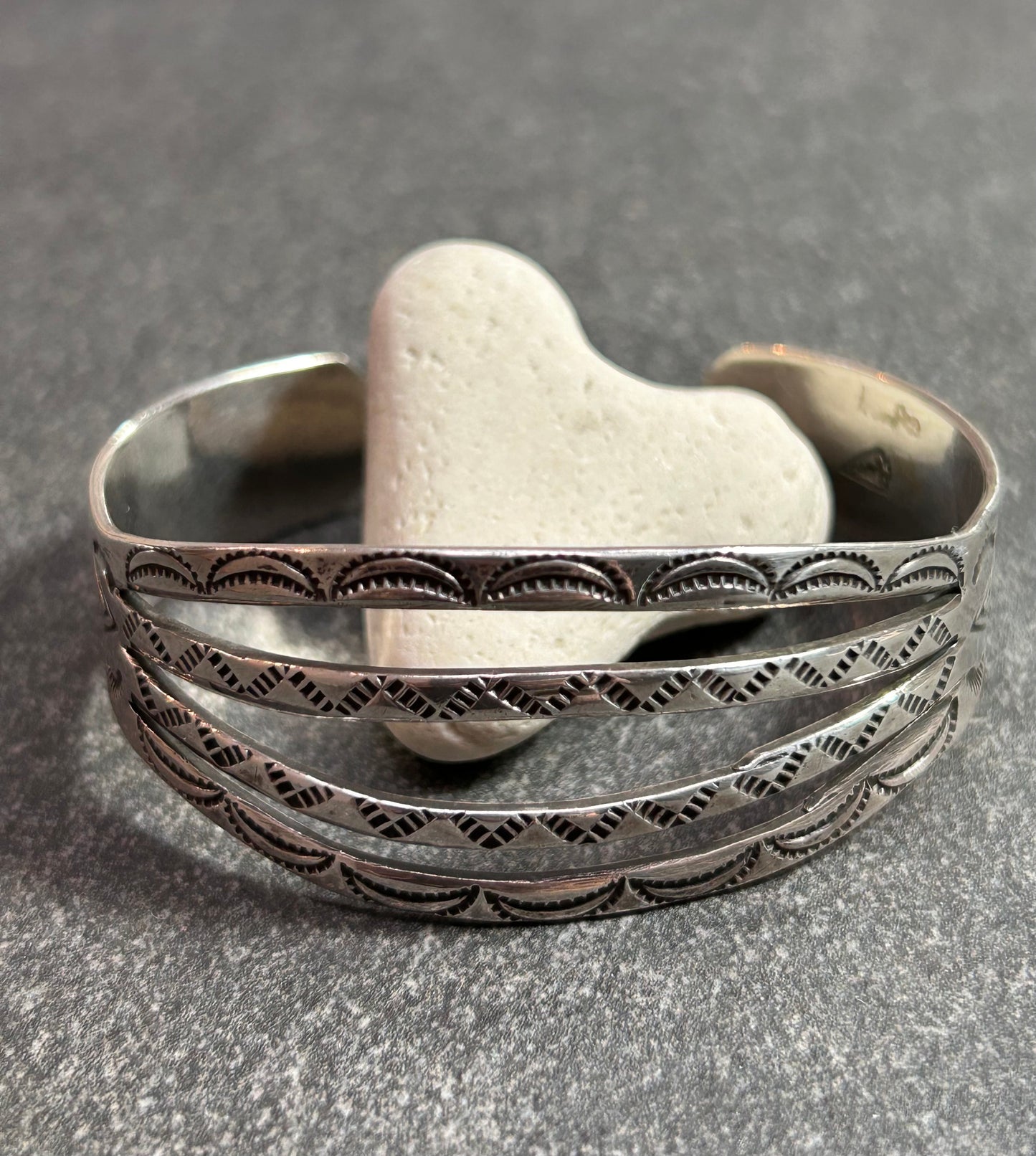 Native American vintage sterling silver bracelet is crafted from a beautifully shaped bar.