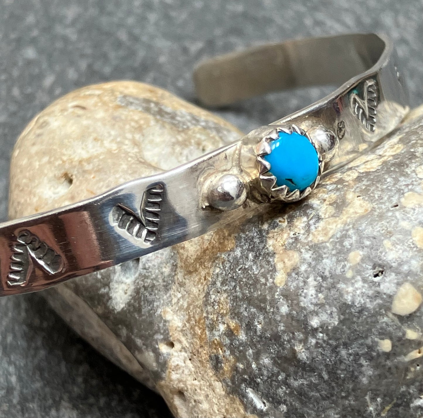 Vintage sterling silver Zuni artisan Childs sterling silver bracelet.