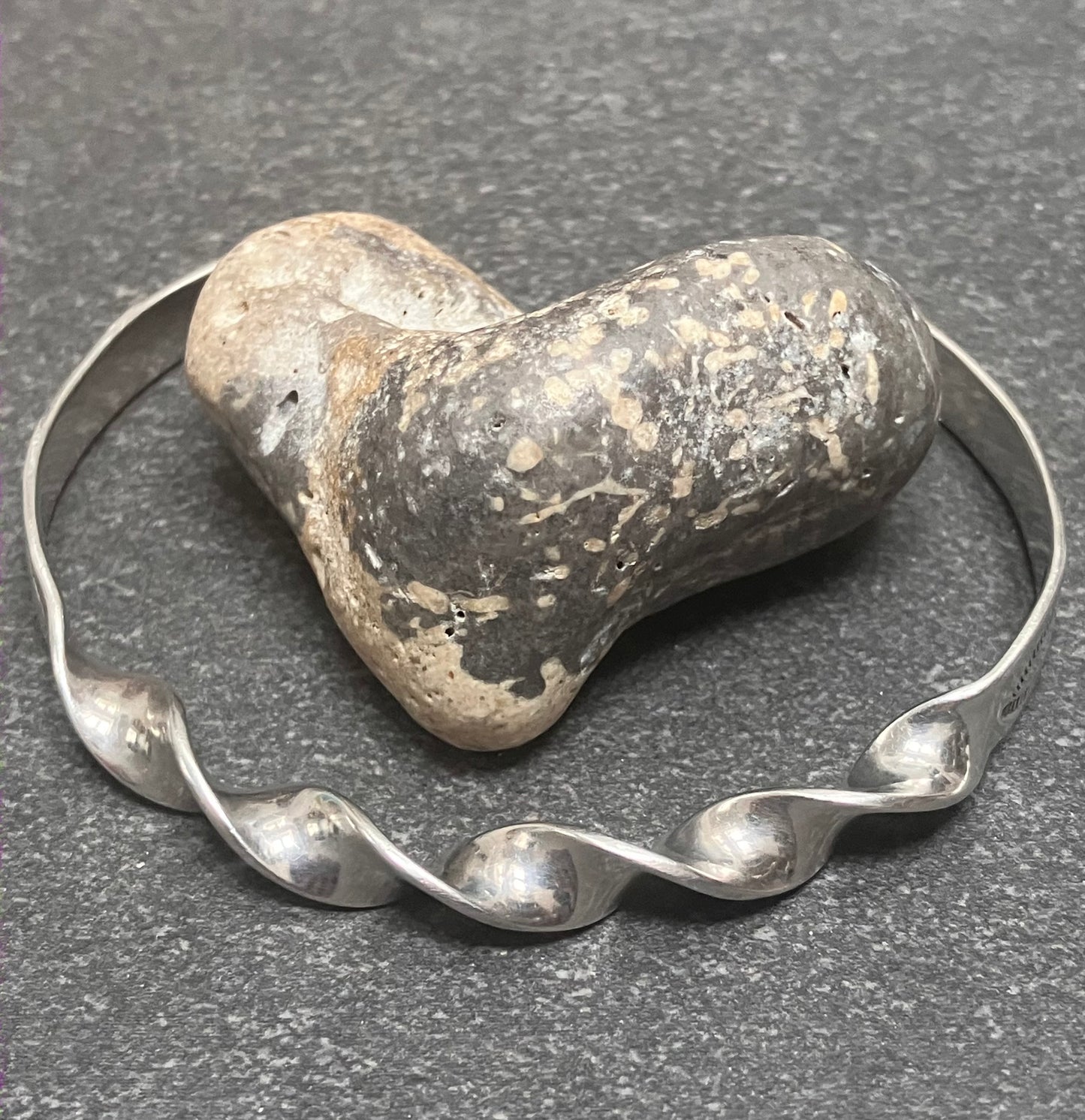 Vintage sterling silver Native American artisan bangle. 1998