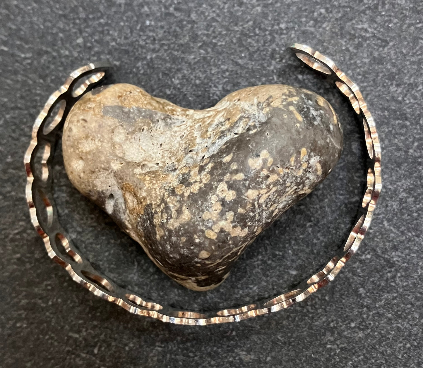 Vintage sterling silver heart bangle.