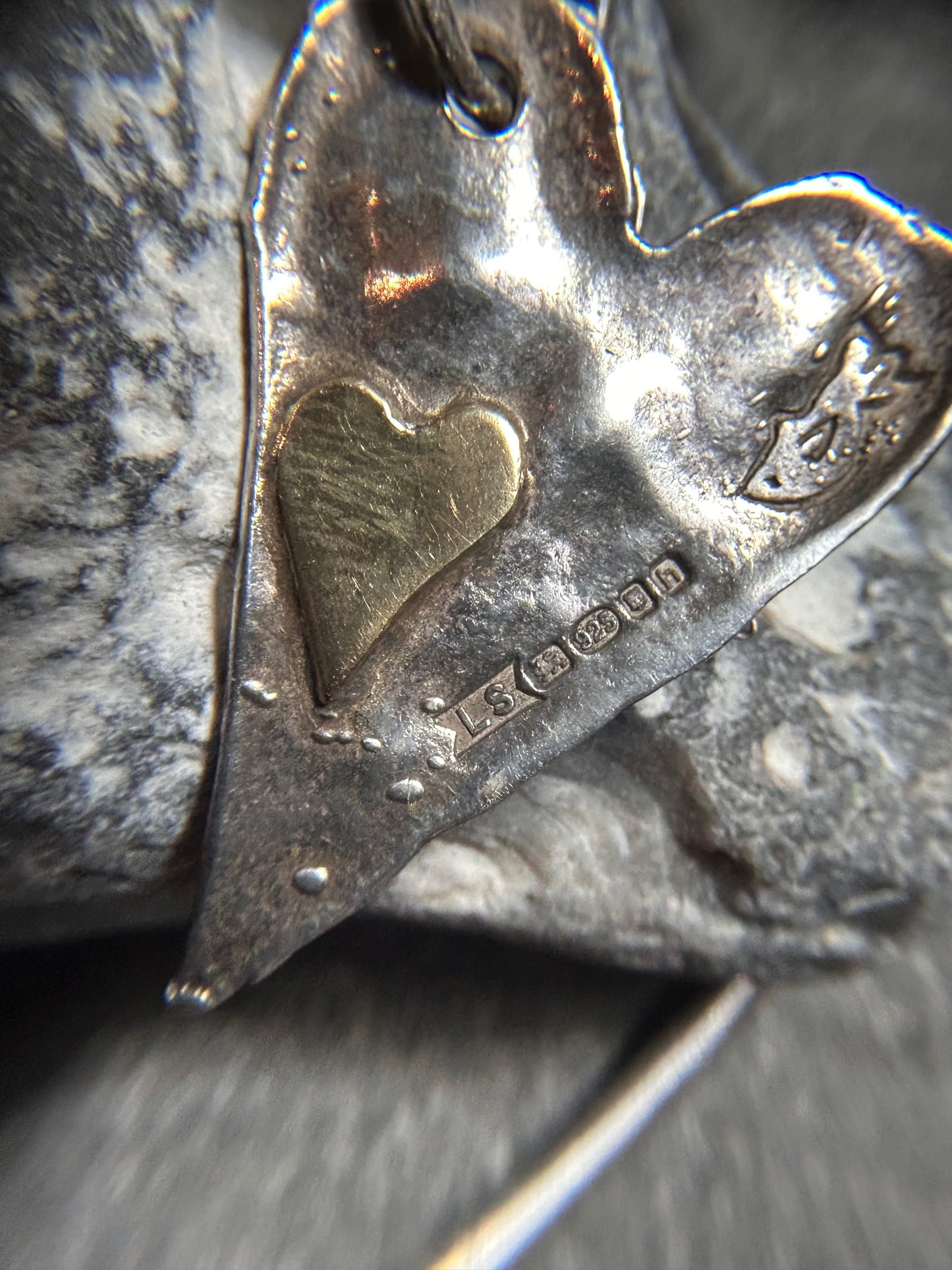 Artisan bangle work ‘X’s and hearts.