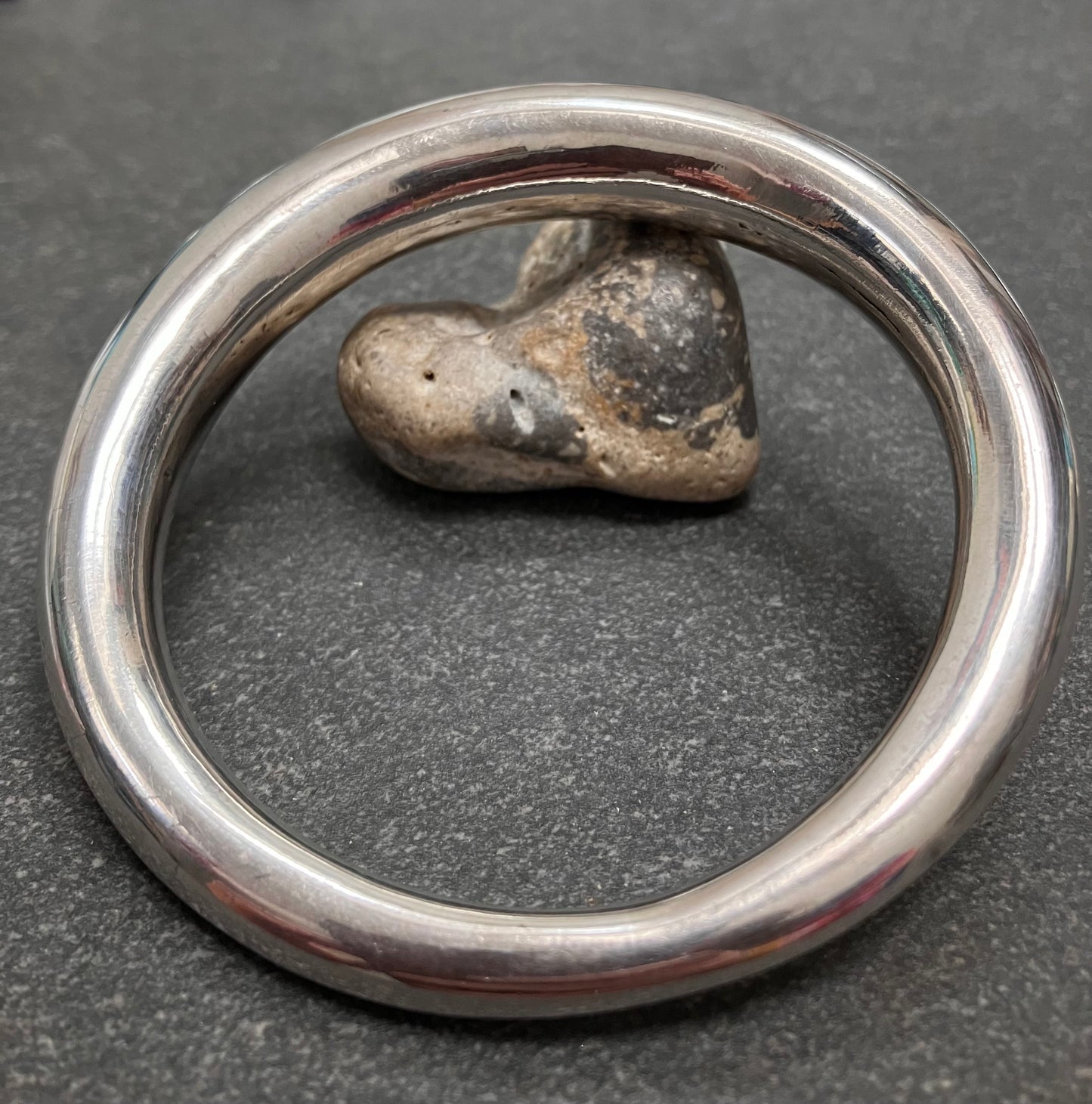 Absolutely beautifully elegant vintage tapered sterling silver bangle.