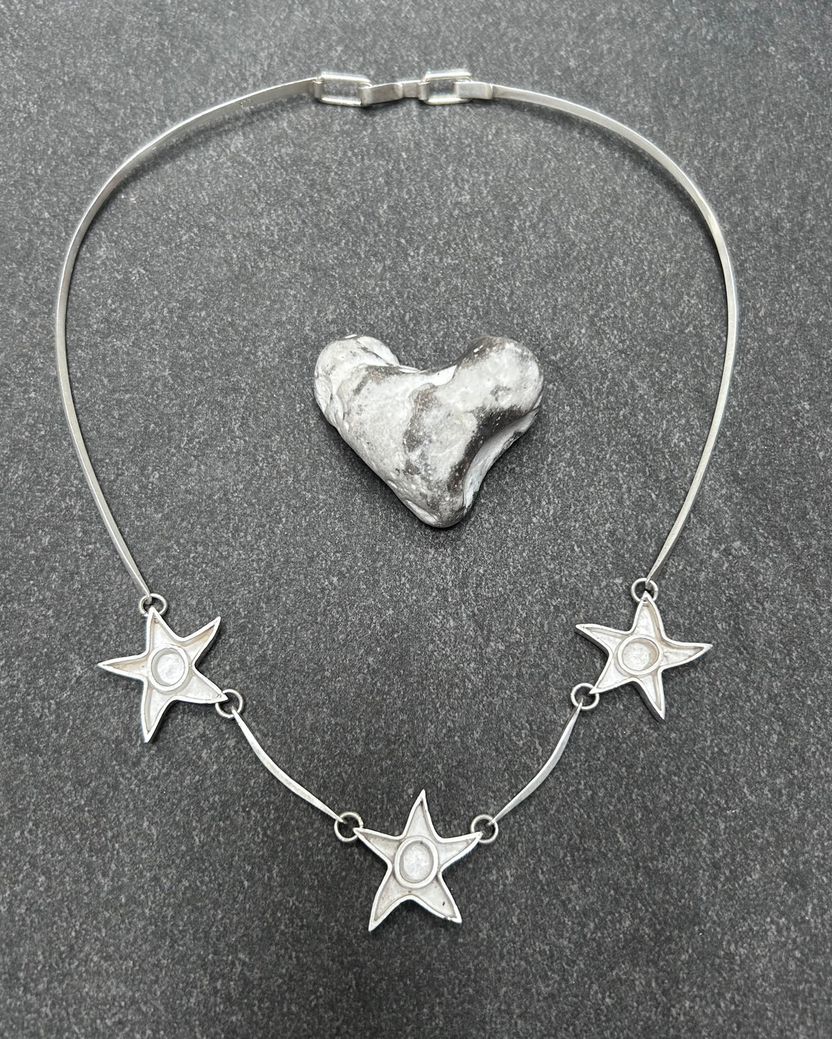Wonderfully sculptural vintage sterling silver star necklace