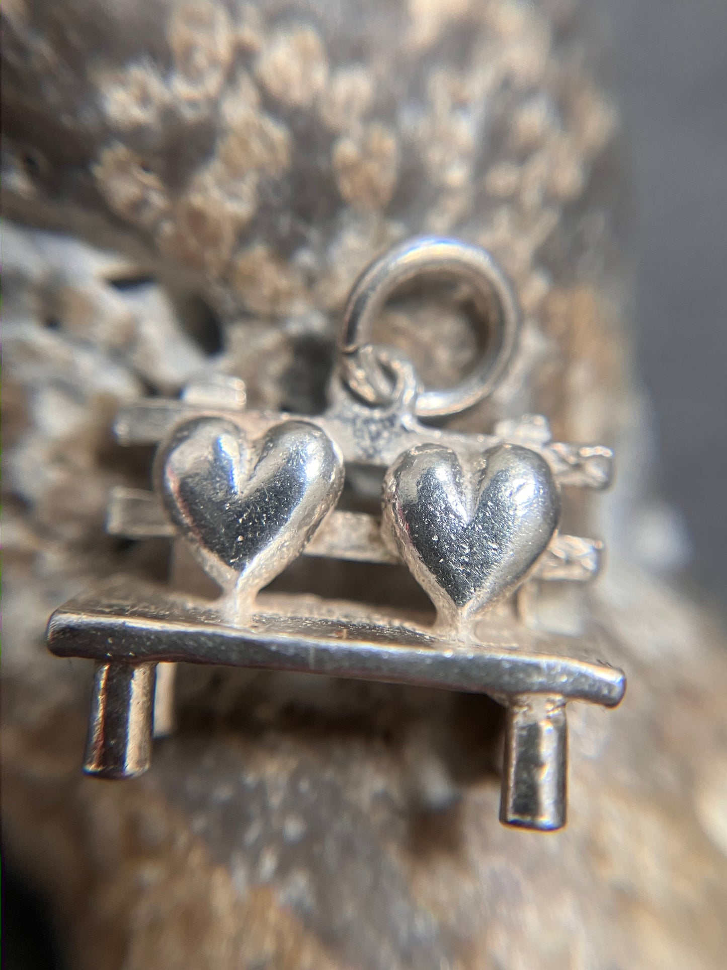 Charming sterling silver vintage love heart bench.