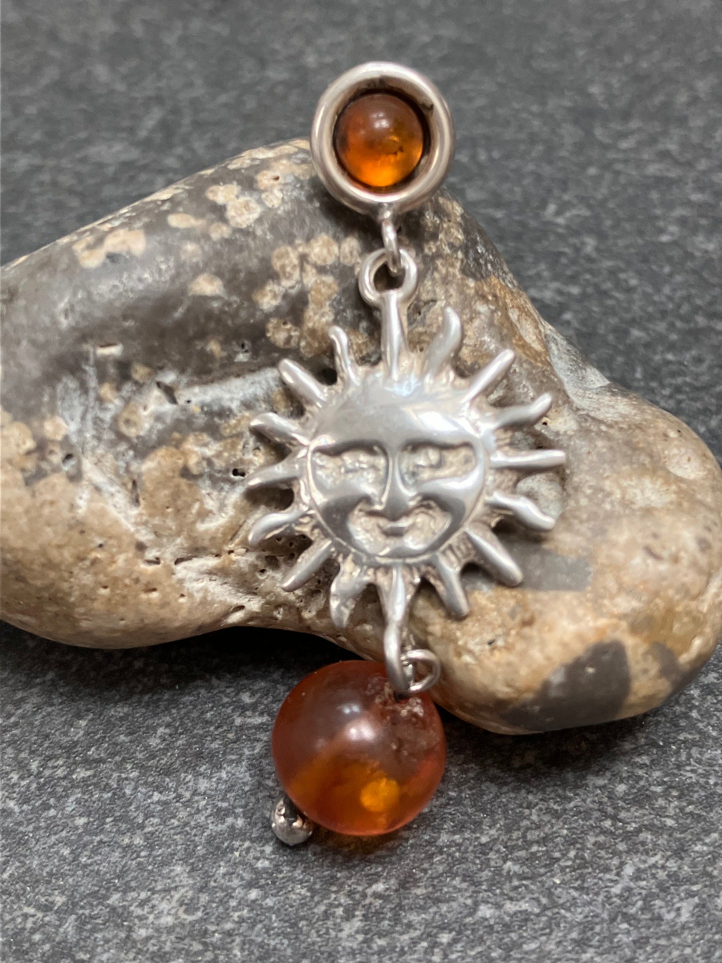 Absolutely fantastic vintage sterling silver sun and amber earrings.