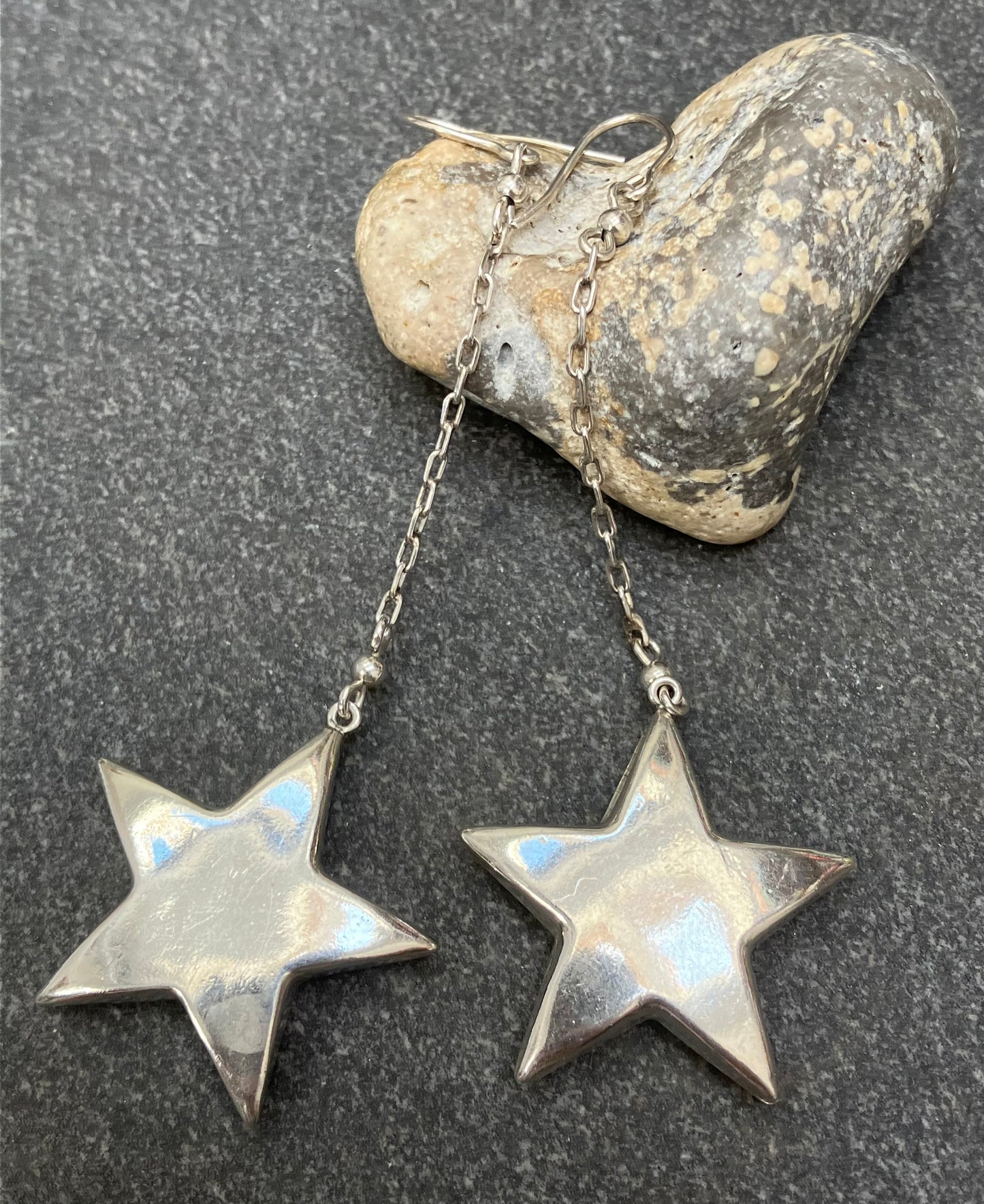 Absolutely fabulous statement vintage sterling silver star earrings.