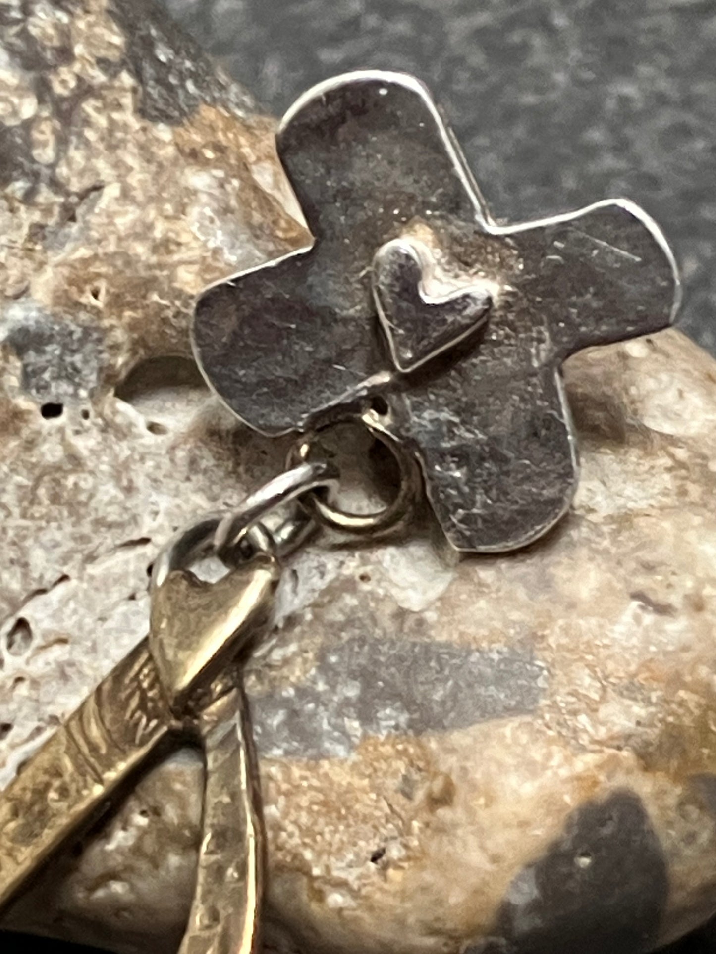 Vintage sterling silver and brass artisan earrings.