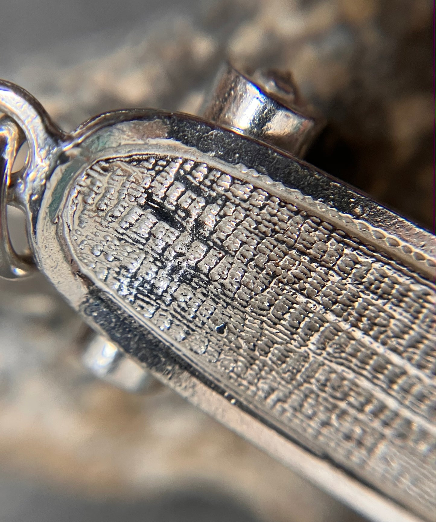 Vintage sterling silver skateboard pendant.