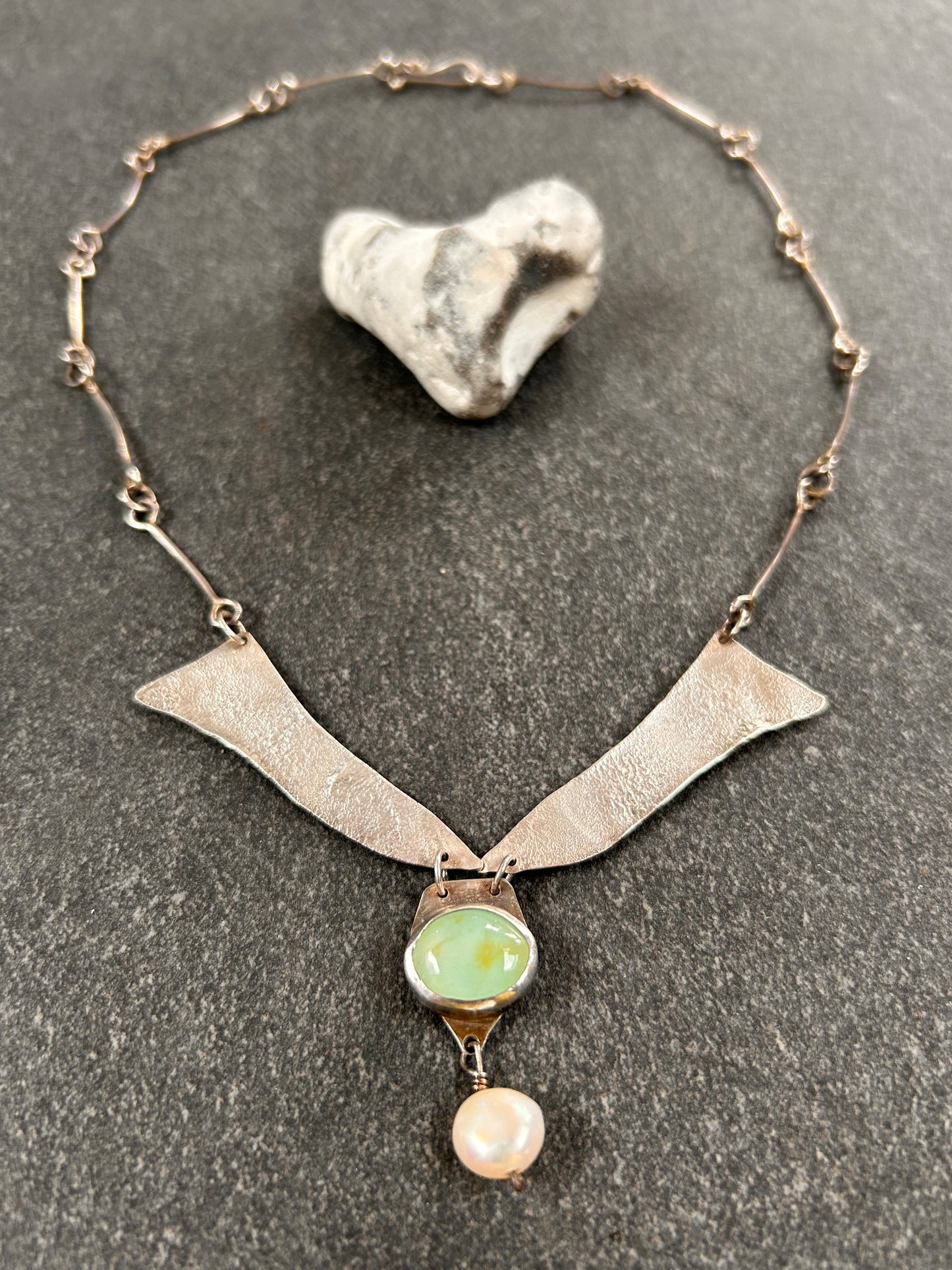 A beautifully handcrafted artisan necklace inspired by the delicate form of sycamore seeds.