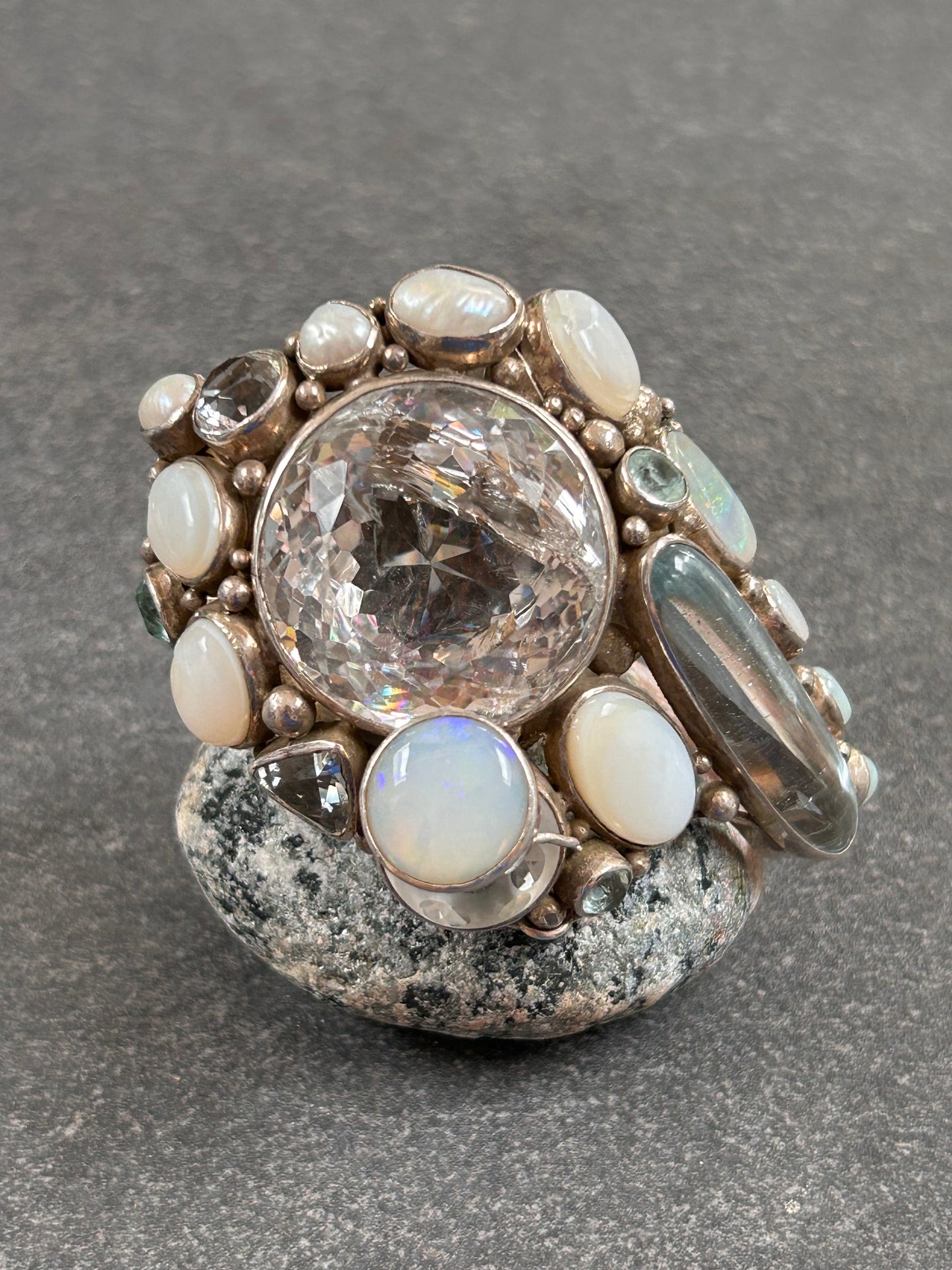 Spectacular Polish Artisan Double-Finger Ring.
Sterling Silver, Rock Crystal, Topaz, Opals, Aquamarine & Pearls.