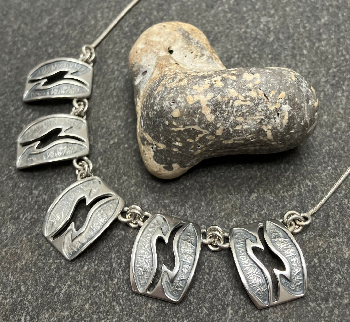 Beautiful vintage sterling silver necklace. Comprising of five beautifully made rectangles.
