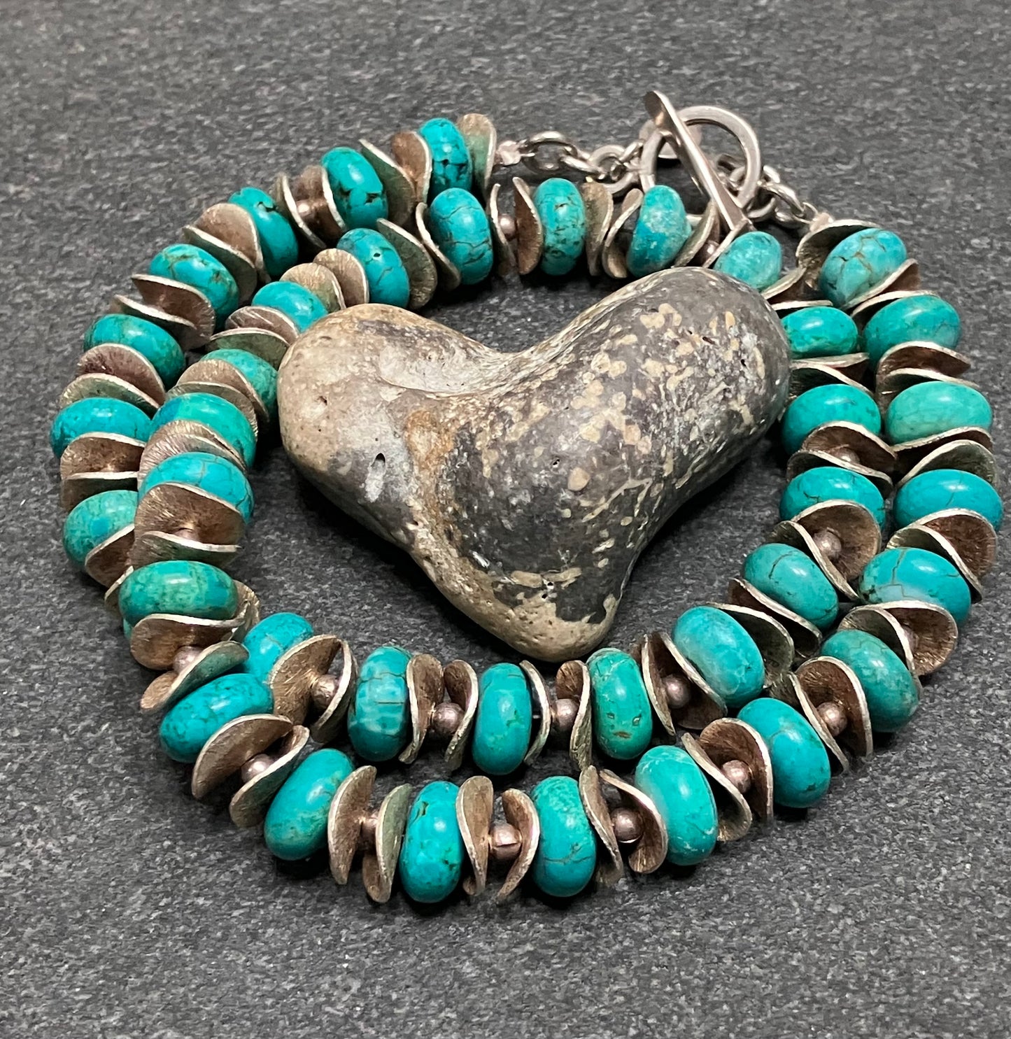 Absolutely stunning artisan made sterling silver and turquoise bead necklace.